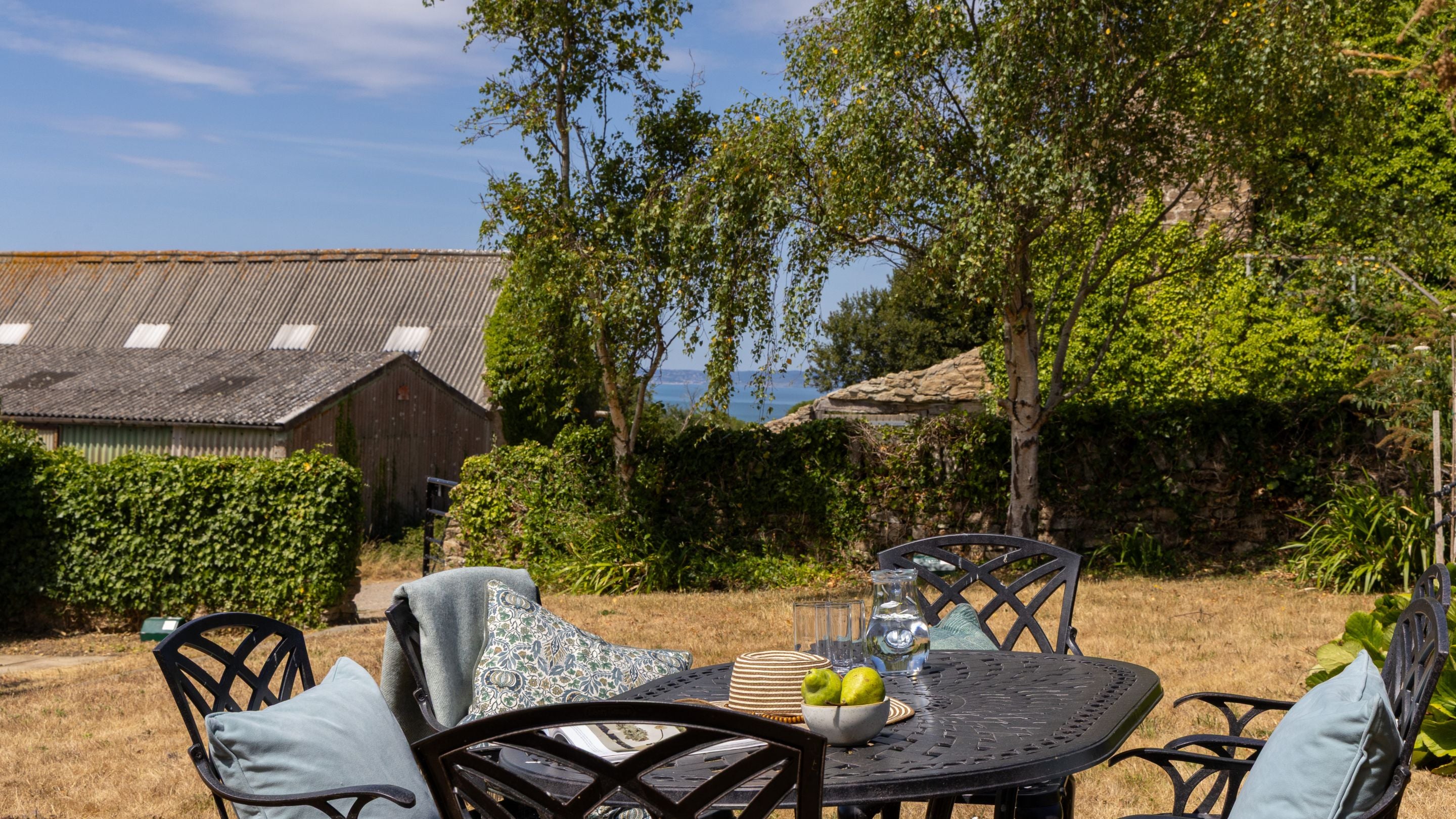 The table and chairs in the front garden at Labour in Vain Cottage, Dorset