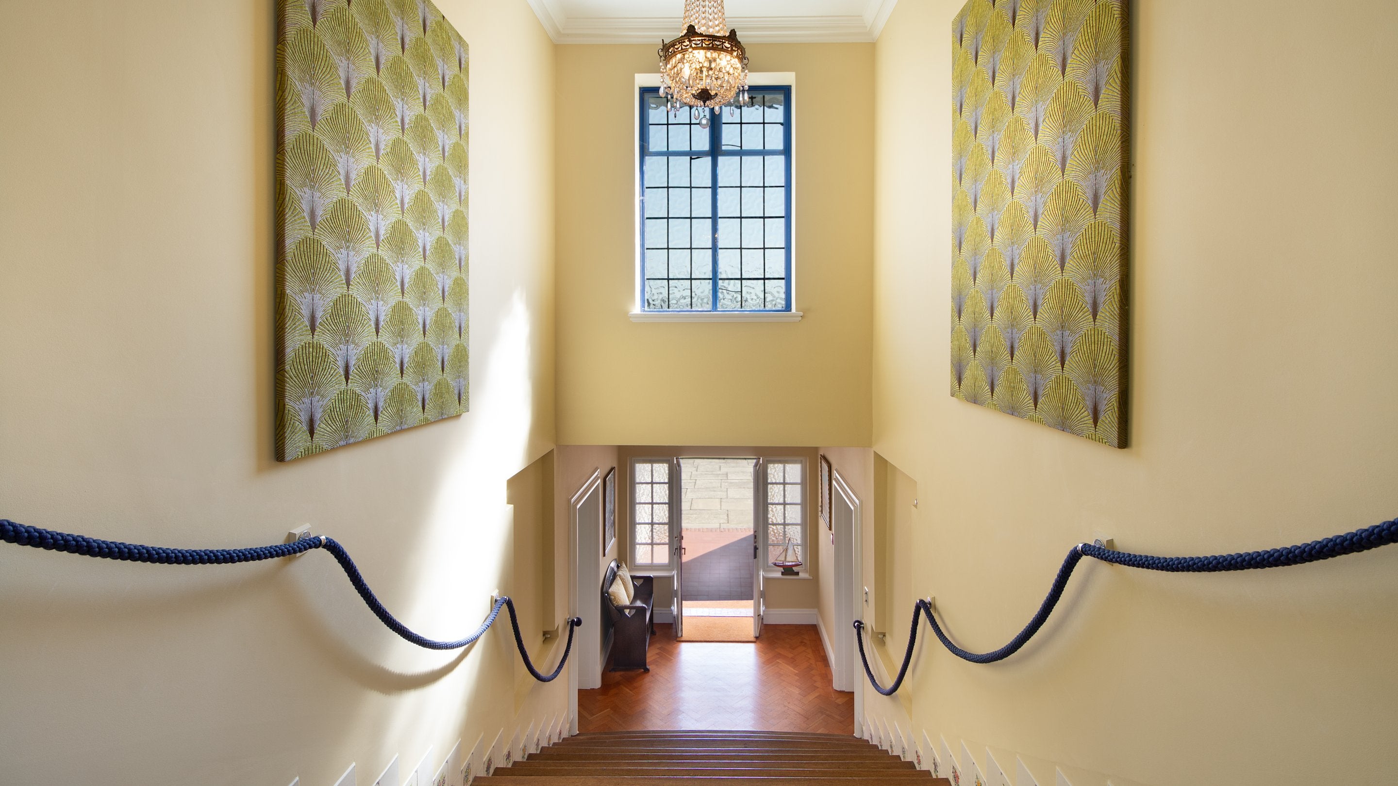 The main staircase and ground floor hall at Portland House, Dorset