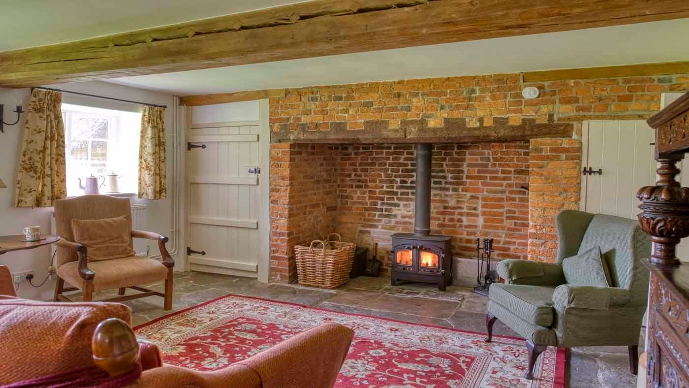 Interior of one of the sitting rooms of Shedbush Farmhouse, nr Bridport, Dorset