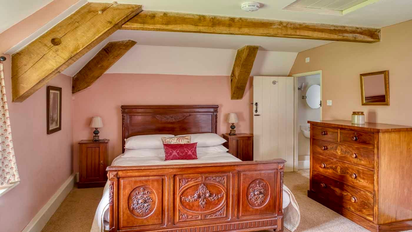 Interior double bedroom of Shedbush Farmhouse, nr Bridport, Dorset