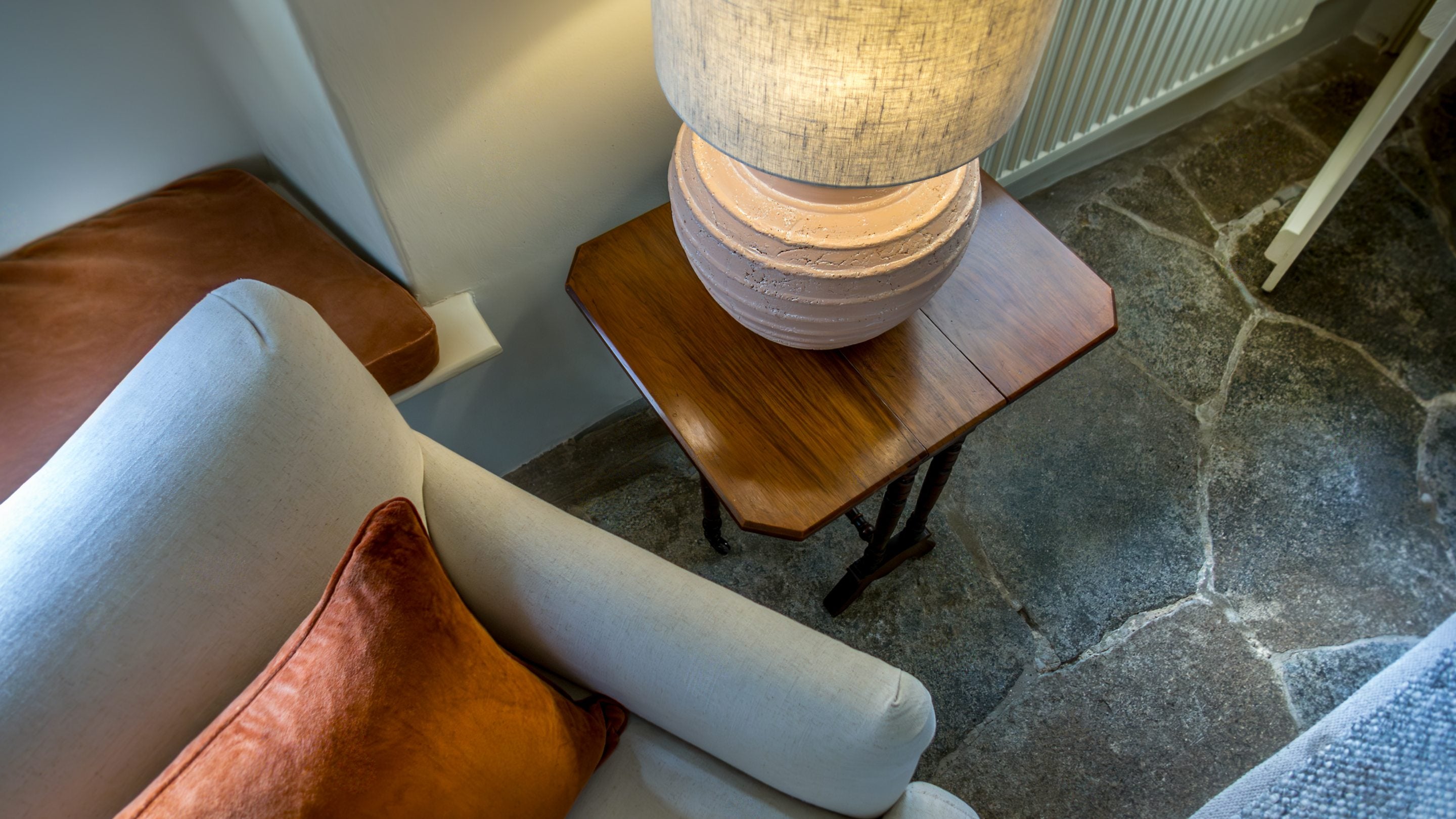 The flagstone floor in the sitting and dining room at Shedbush Farm House, Dorset