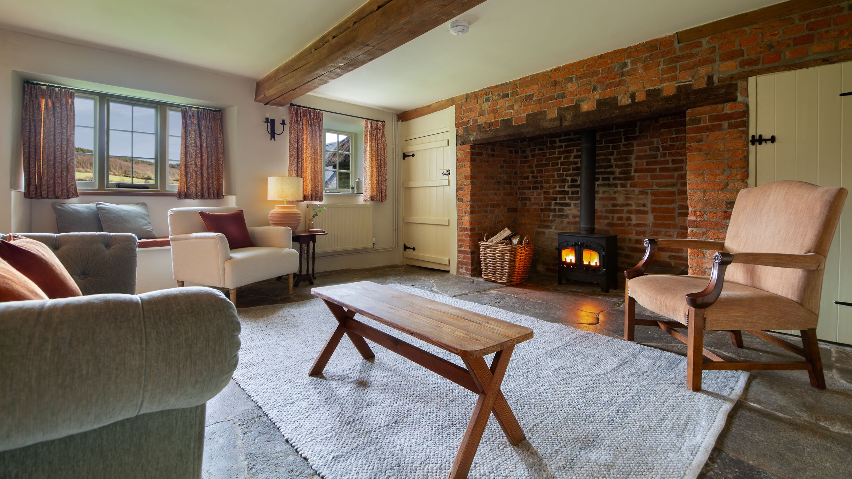 The sitting area in the open-plan sitting and dining room at Shedbush Farm House, Dorset