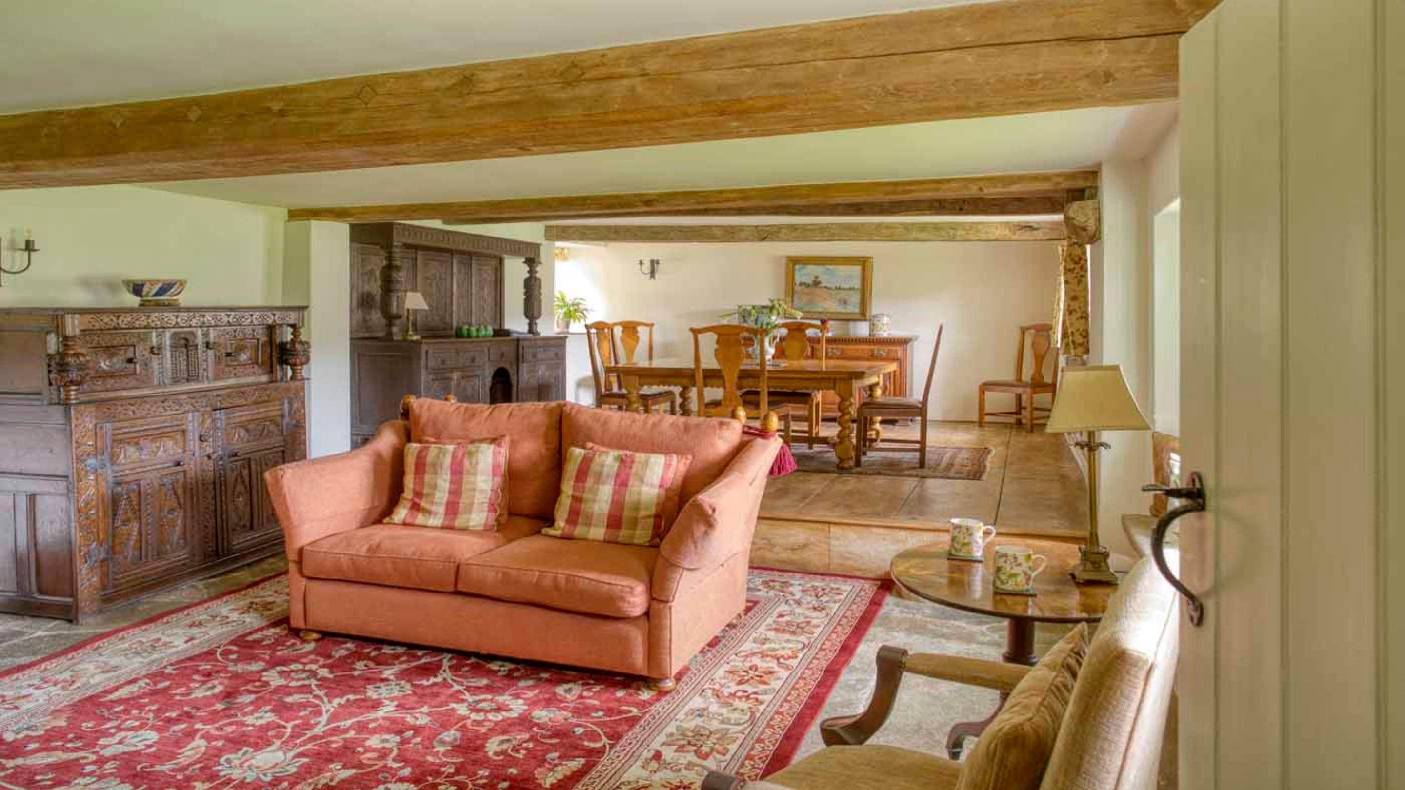 The sitting and dining room Shedbush Farmhouse, Dorset.