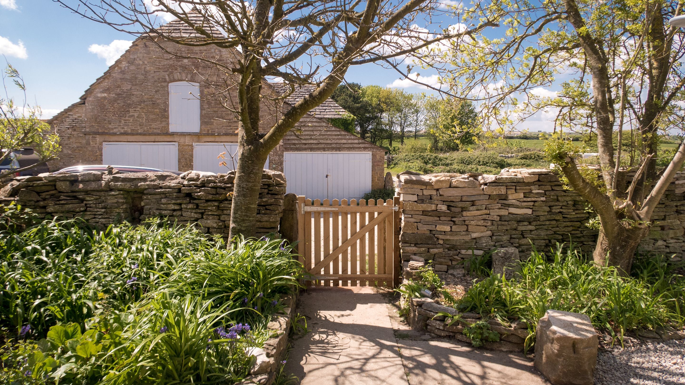 View down the garden path at Spyway (outbuildings are not accessible to guests), Dorset