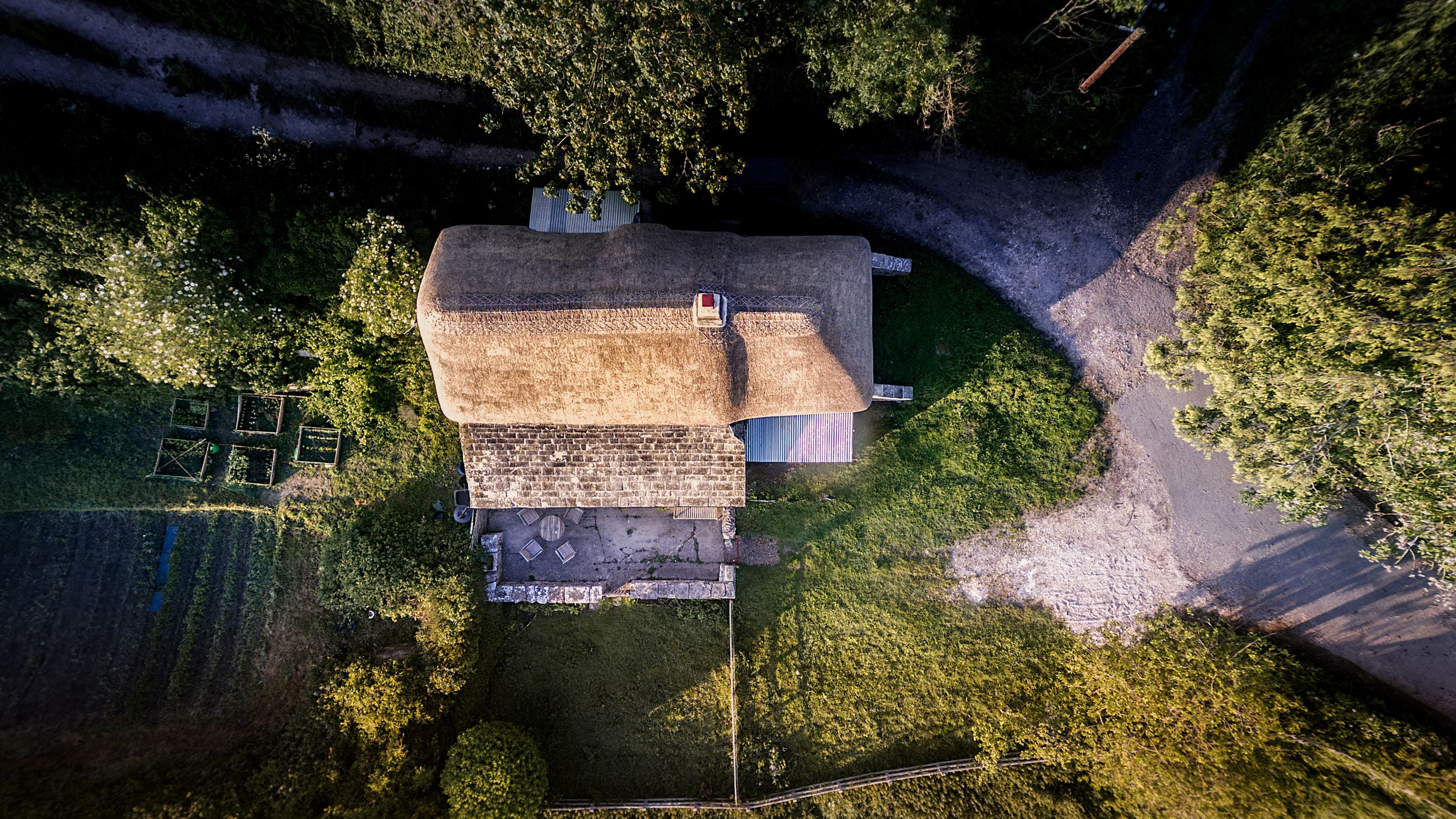 An aerial view of Vineyard Farm Cottage and its garden, Dorset