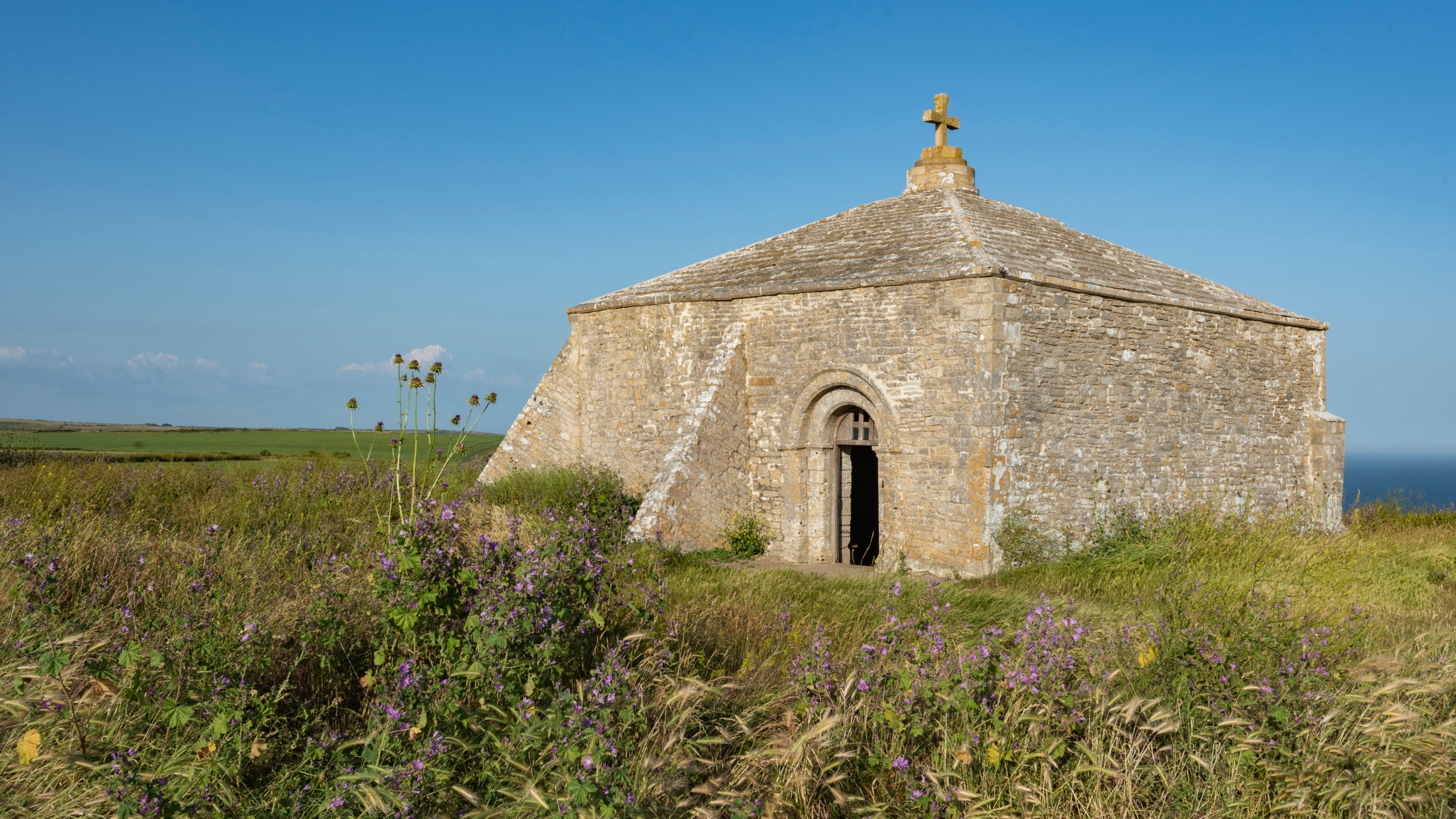 St. Aldhelm's Chapel, a small, stone building on the coast near Weston Farm Campsite, Dorset