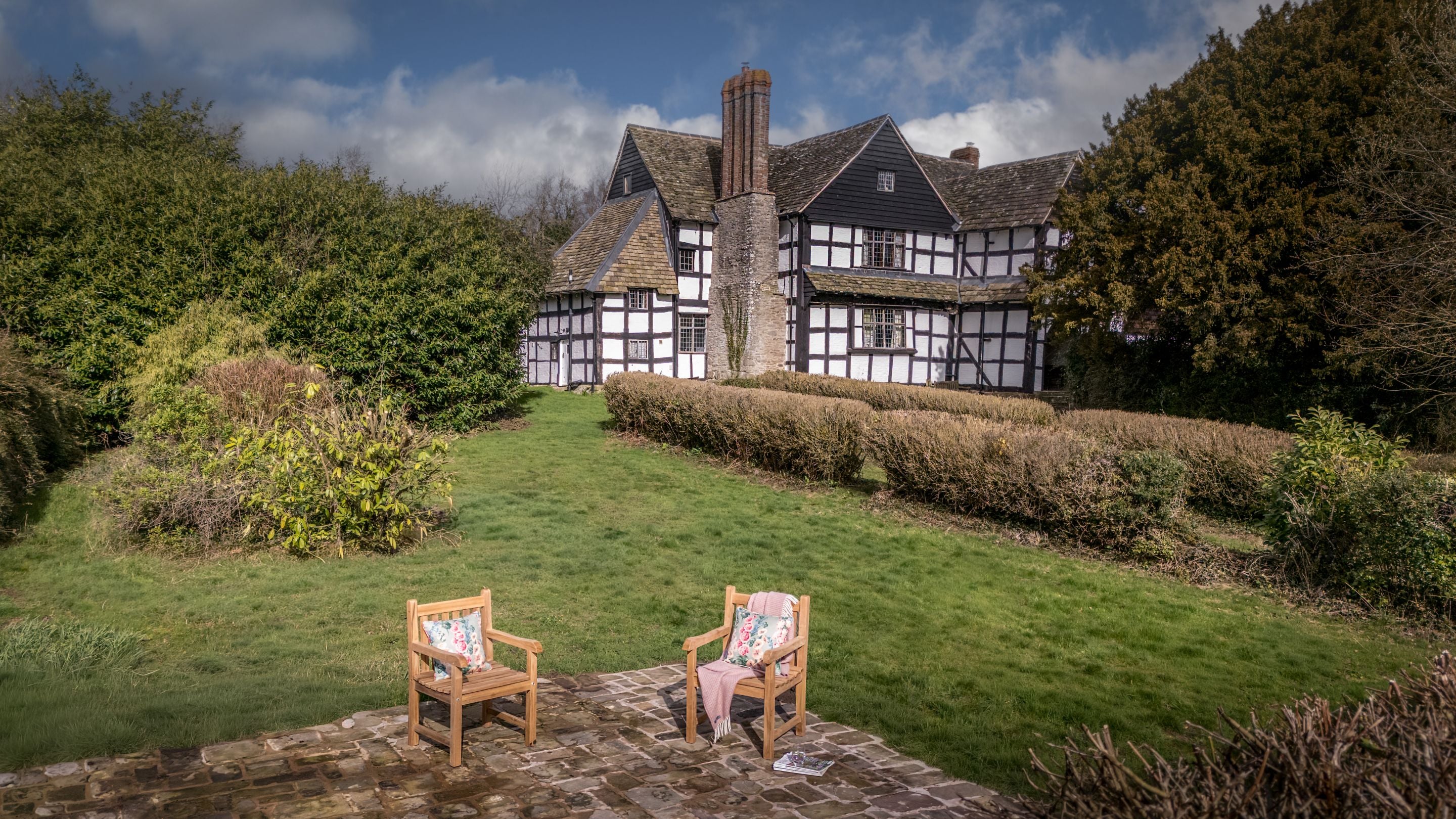 An aerial view of Cwmmau Farmhouse and its garden, Herefordshire