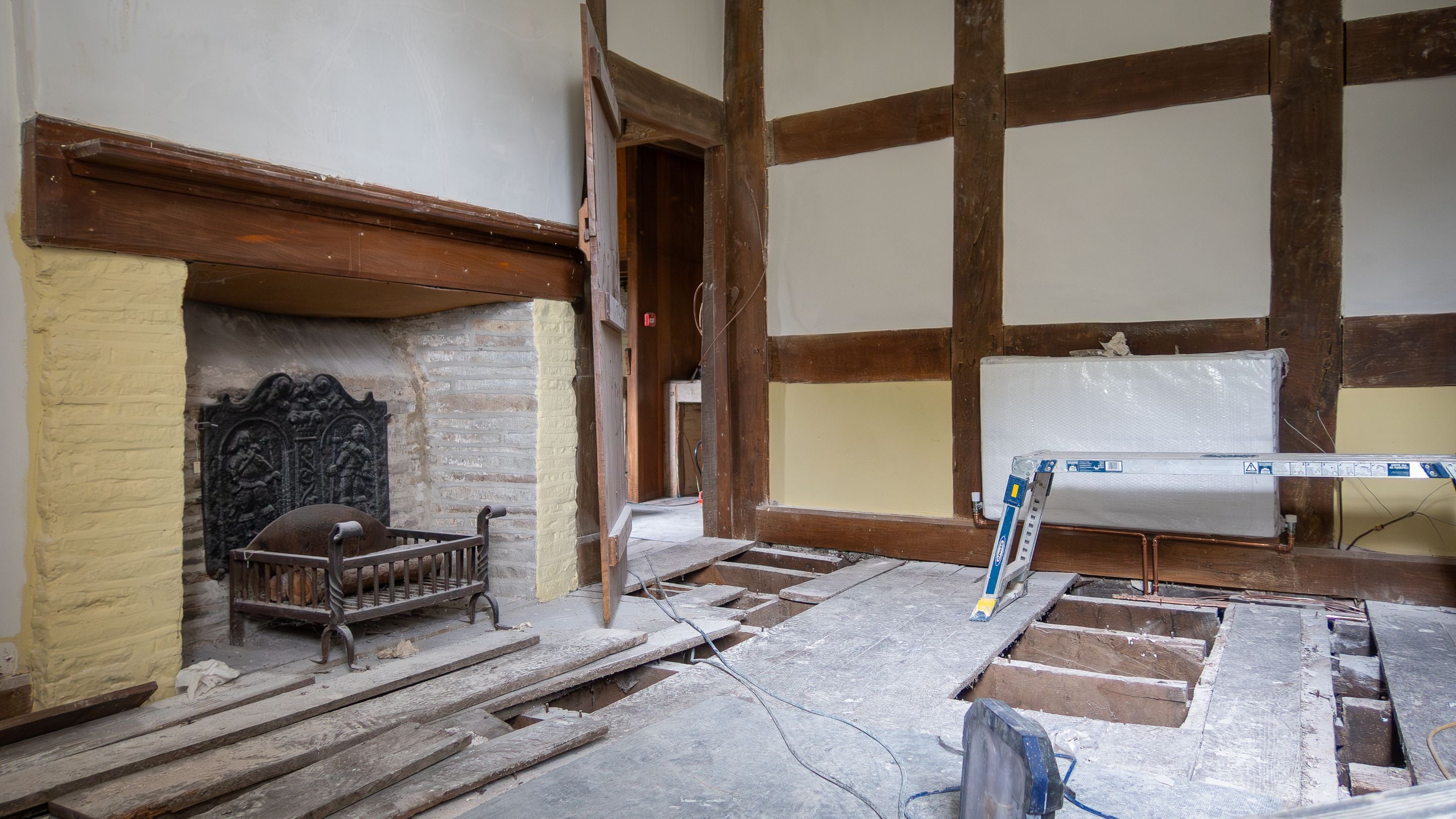 Cwmmau Farmhouse under restoration, showing the fireplace in one of the rooms, Herefordshire