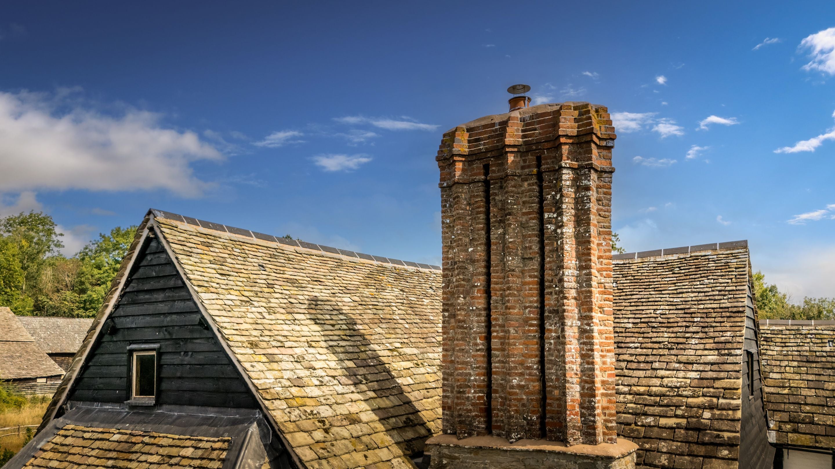 Cwmmau Farmhouse under restoration, showing the roof and chimney, Herefordshire