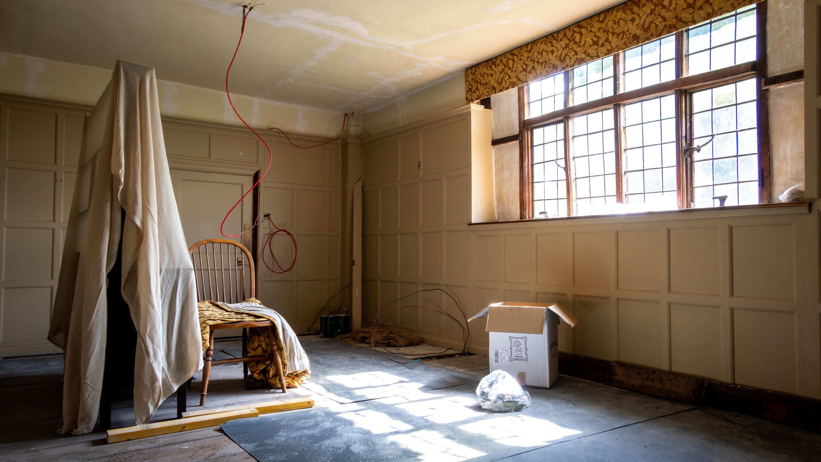 Cwmmau Farmhouse under restoration, showing the original panelling in one of the rooms, Herefordshire