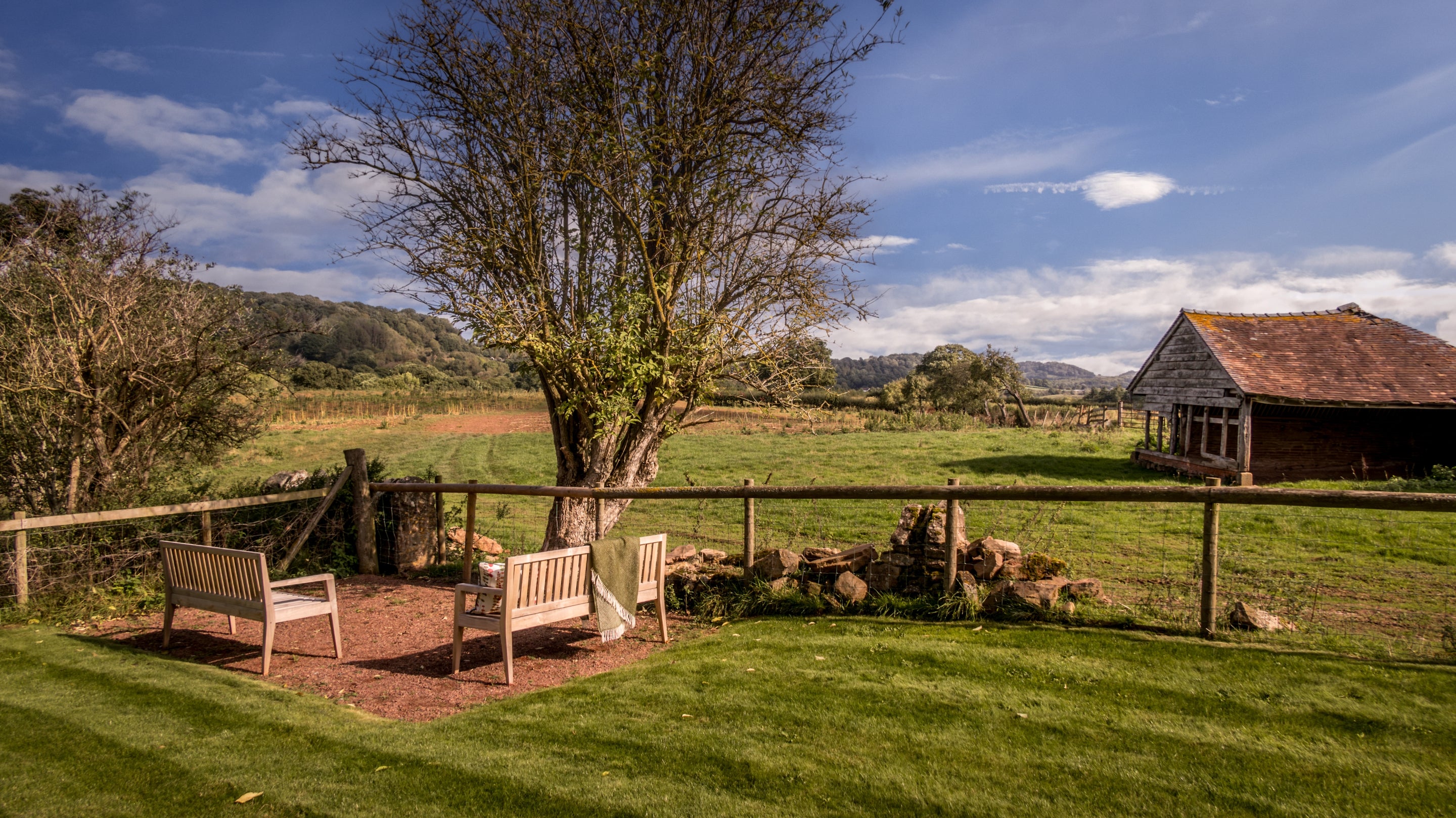 The outdoor seating area at Hop Kiln Farmhouse, Herefordshire