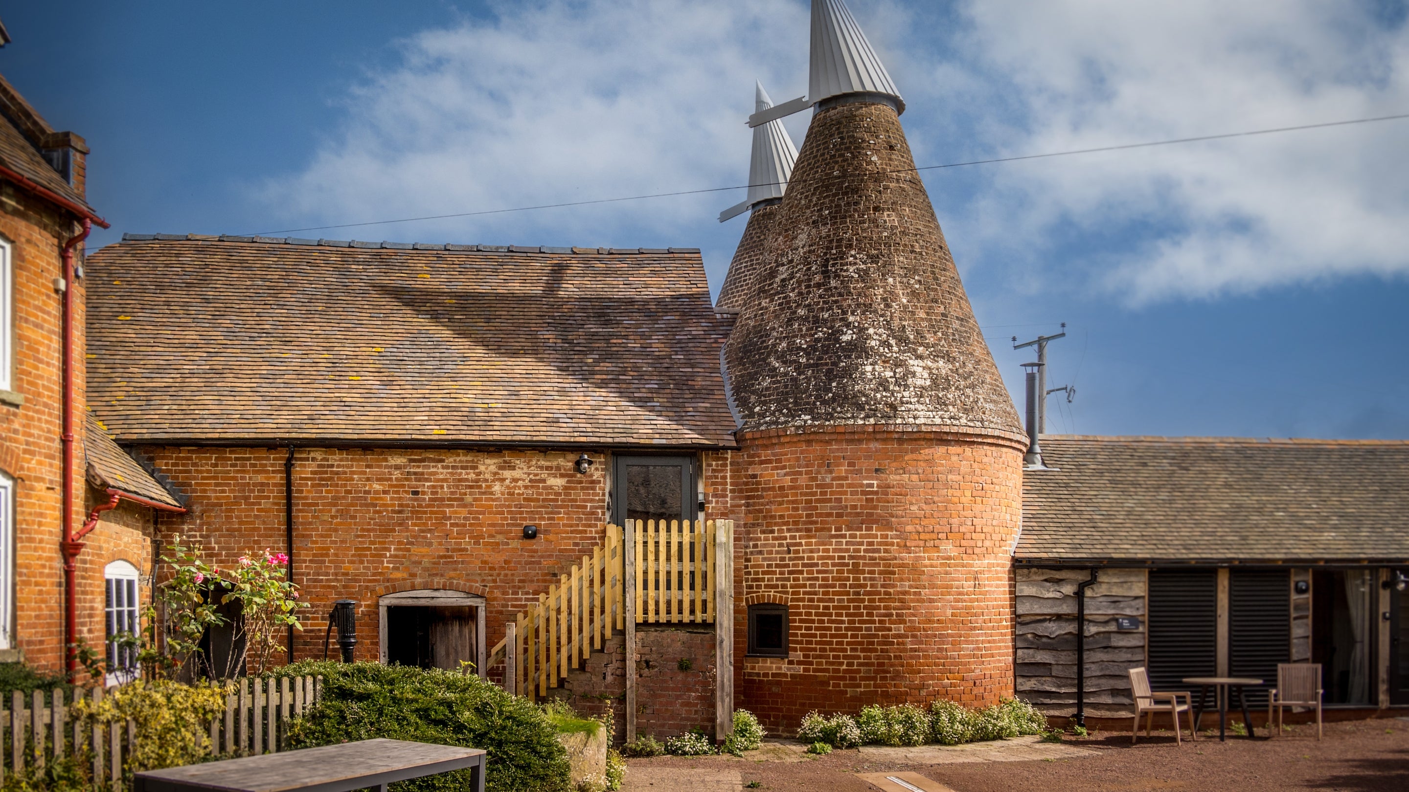 The exterior of Hop Kiln Mews and neighbouring cottages, Herefordshire