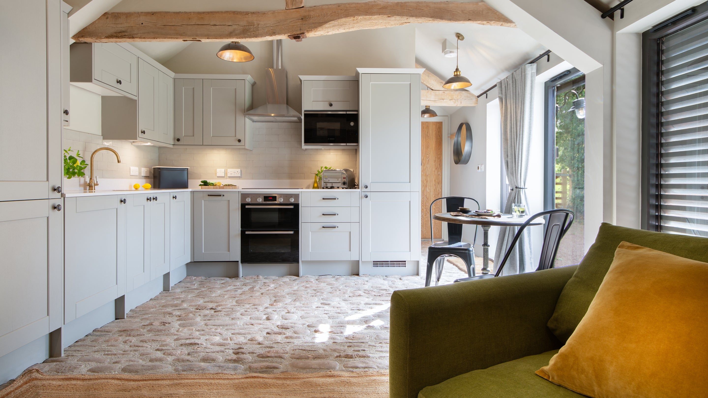 The open-plan kitchen, dining and sitting room at Kiln Barn, Herefordshire
