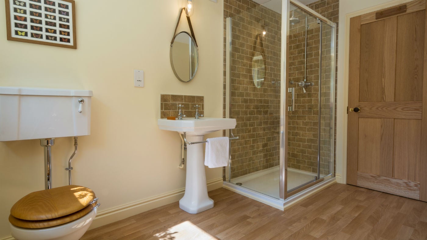 An en-suite bathroom at Mottistone Manor Farmhouse, Mottistone, Isle of Wight