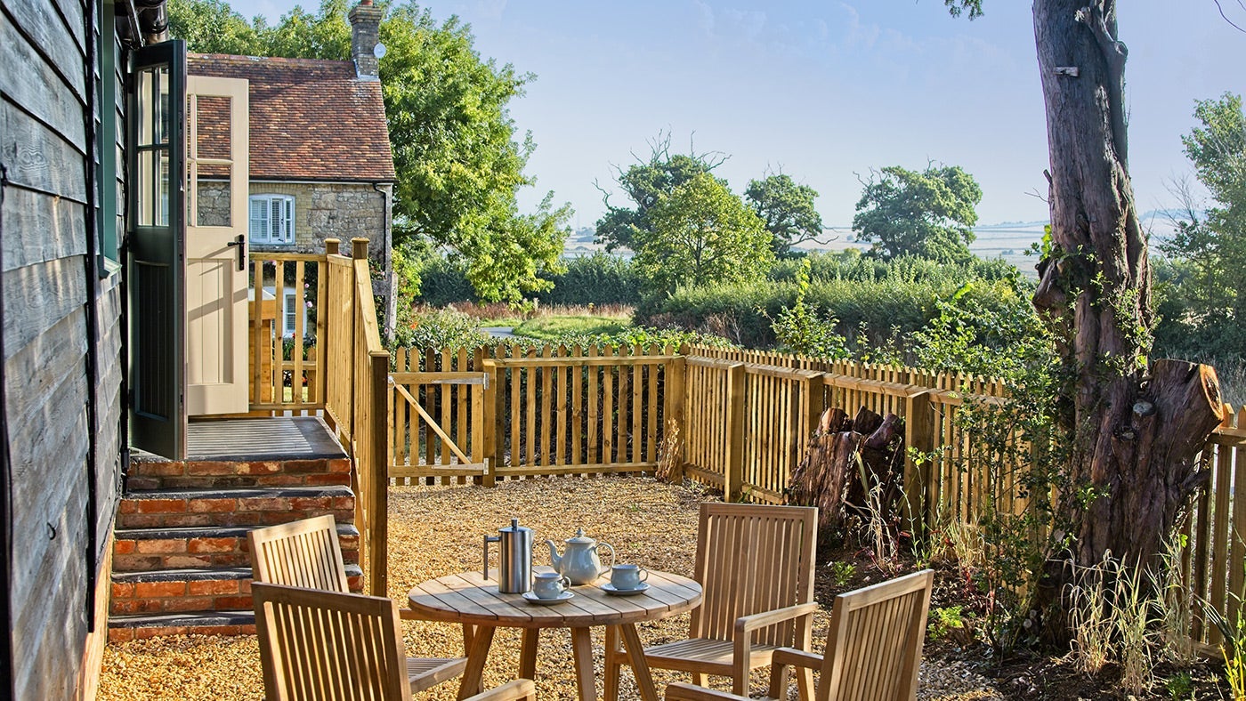 The outside seating area at Newtown Cabin, Isle of Wight