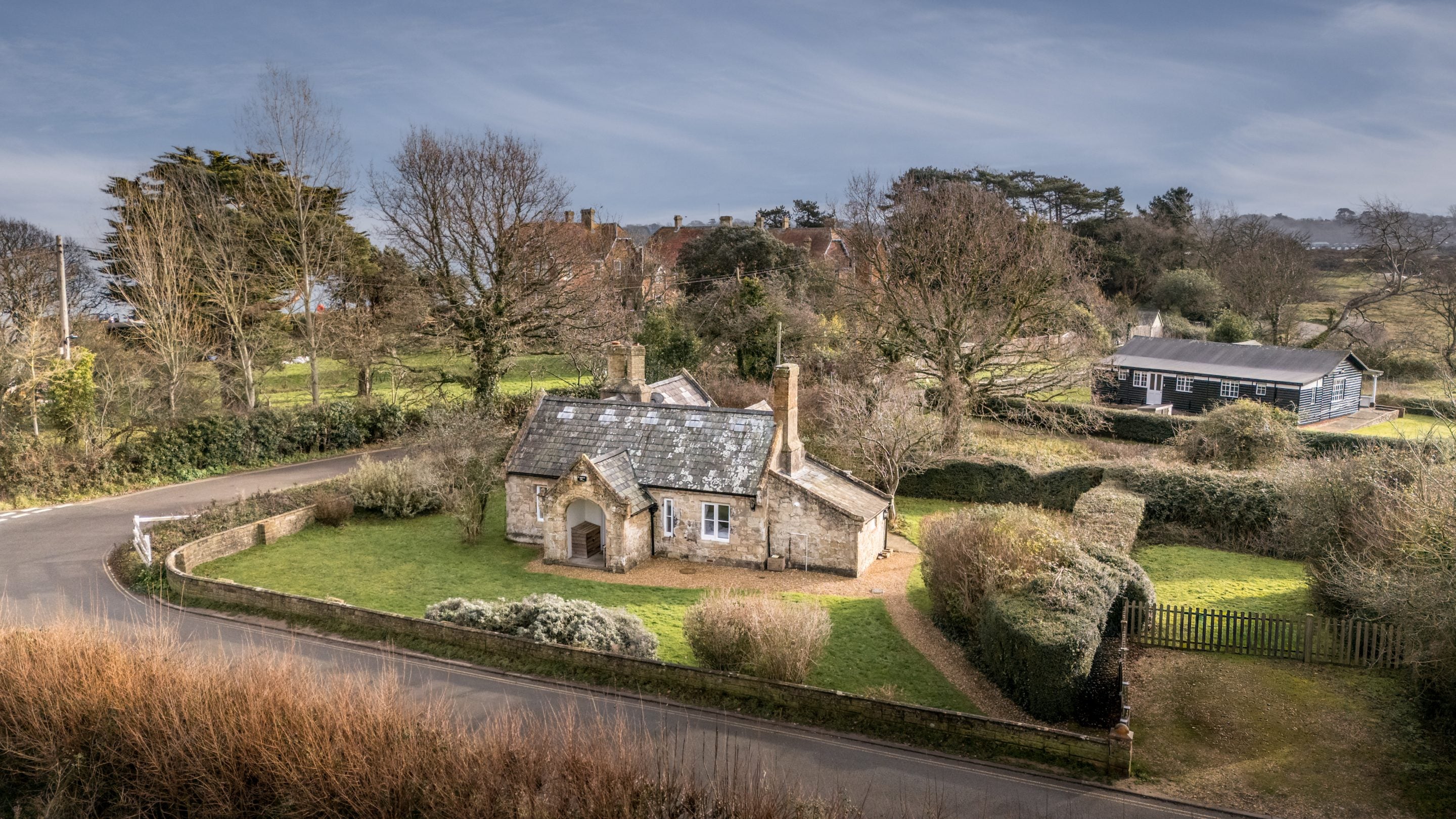 An aerial view of Old Church Lodge and its grassed garden, Isle Of Wight