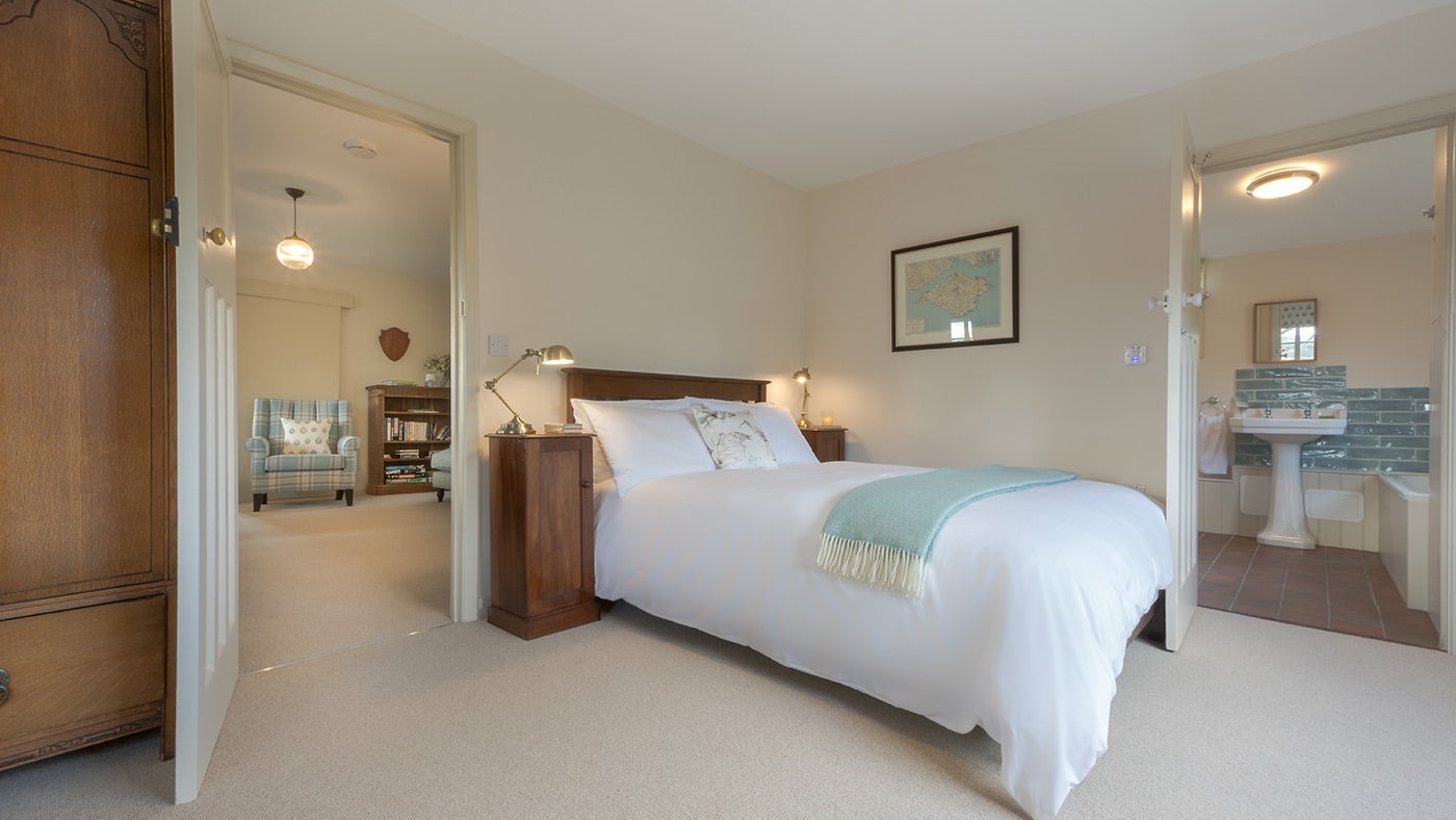 The master bedroom at The Old Club House, St Helens, Isle of Wight