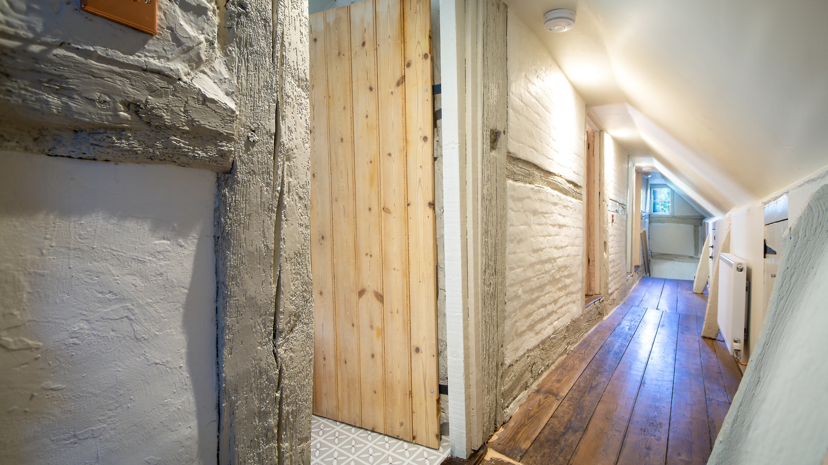 The first-floor hallway at Chodds Farmhouse, West Sussex