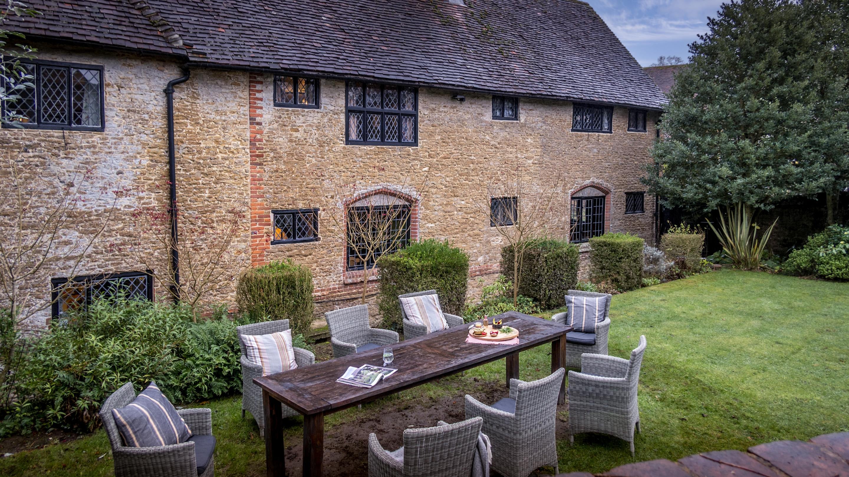 The rear exterior and outdoor furniture at Emley Farmhouse, Surrey