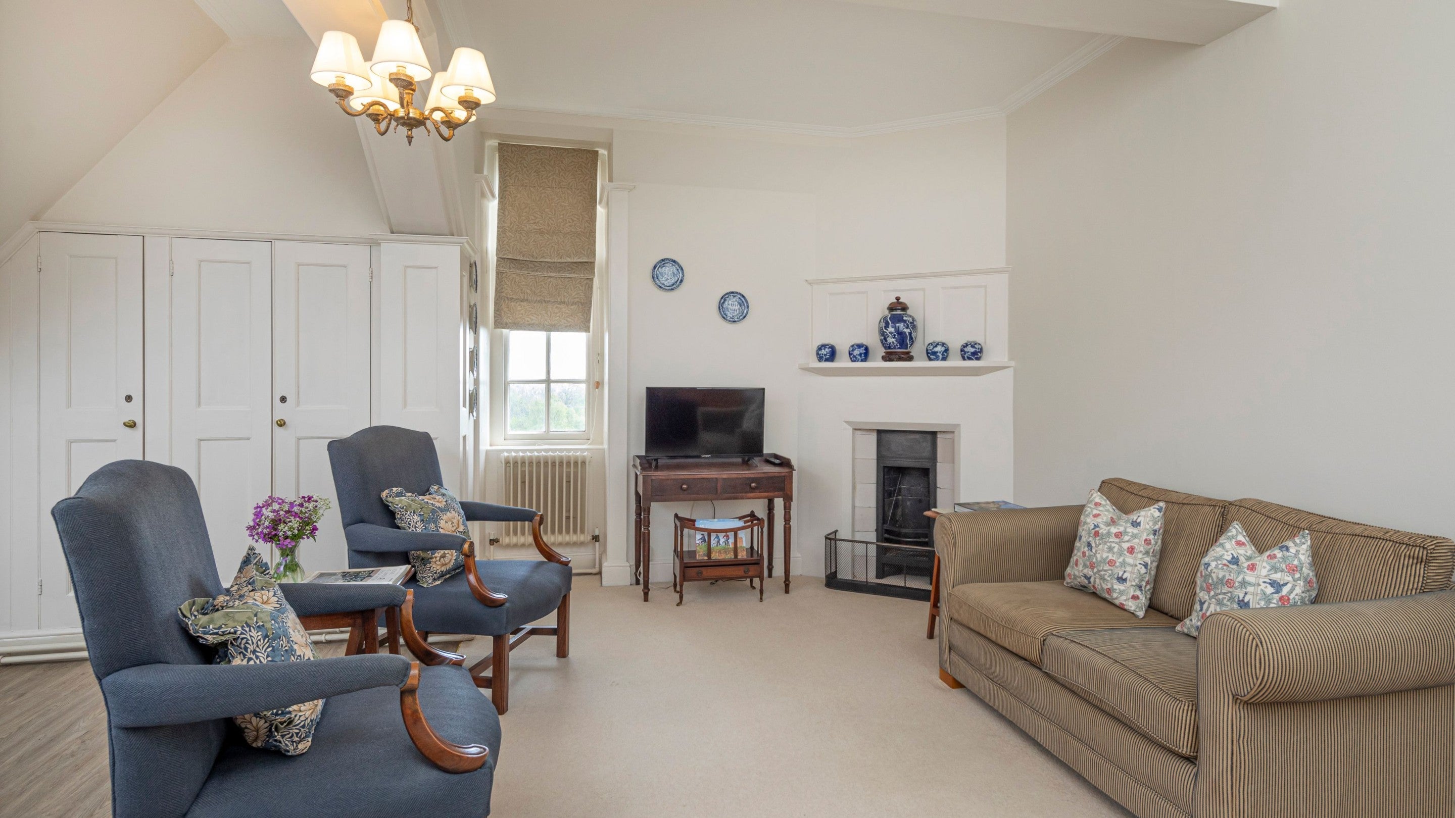 The sitting area in the open-plan living space at The Morris Apartment, West Sussex