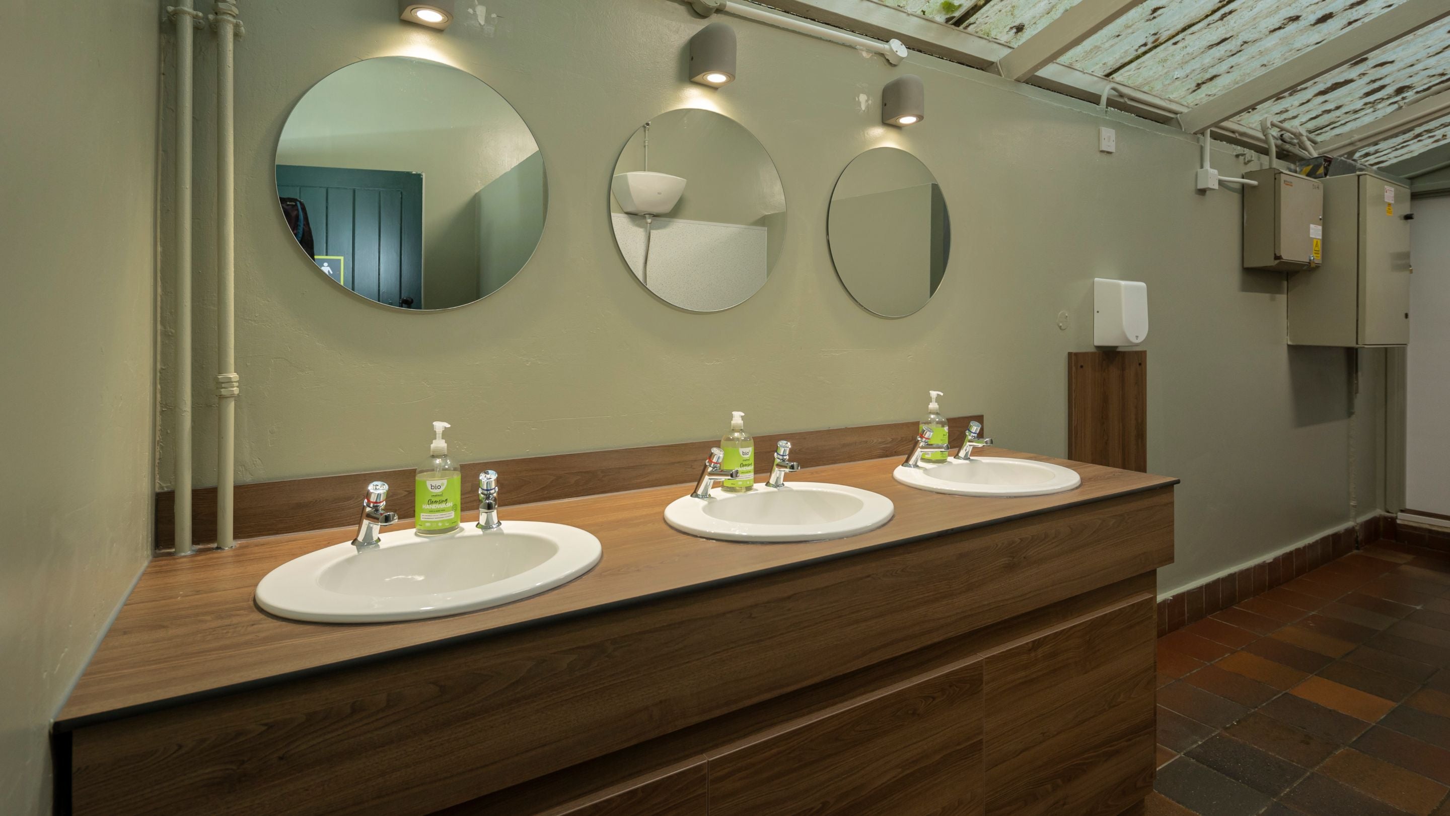 Sinks in the facilities block at Oldbury Hill Campsite, Kent