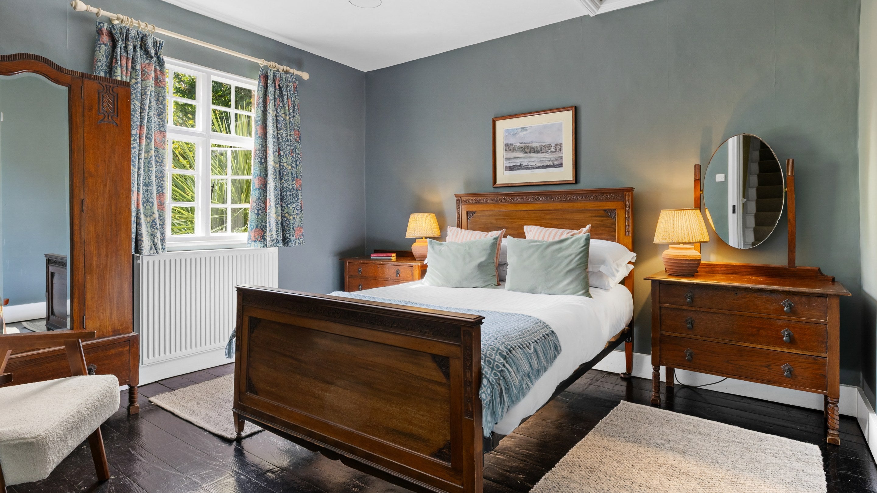 The double bedroom on the ground floor of Polesden Garden Cottage, Surrey