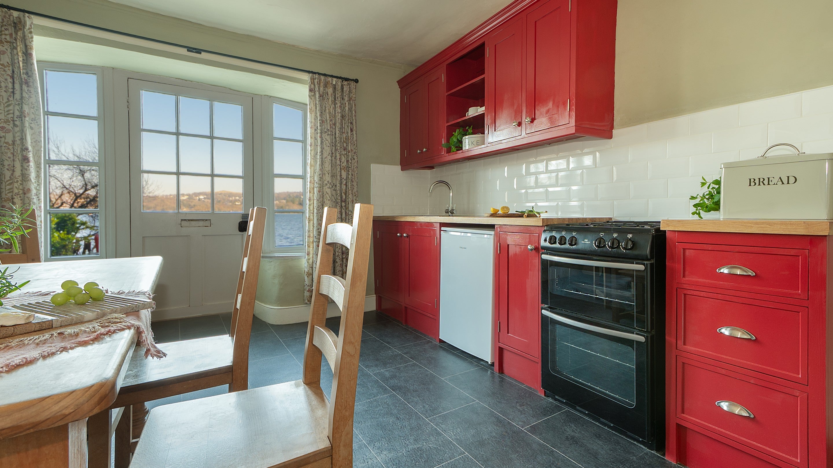 The kitchen-diner at High Strawberry Gardens, with views of Lake Windermere, Cumbria