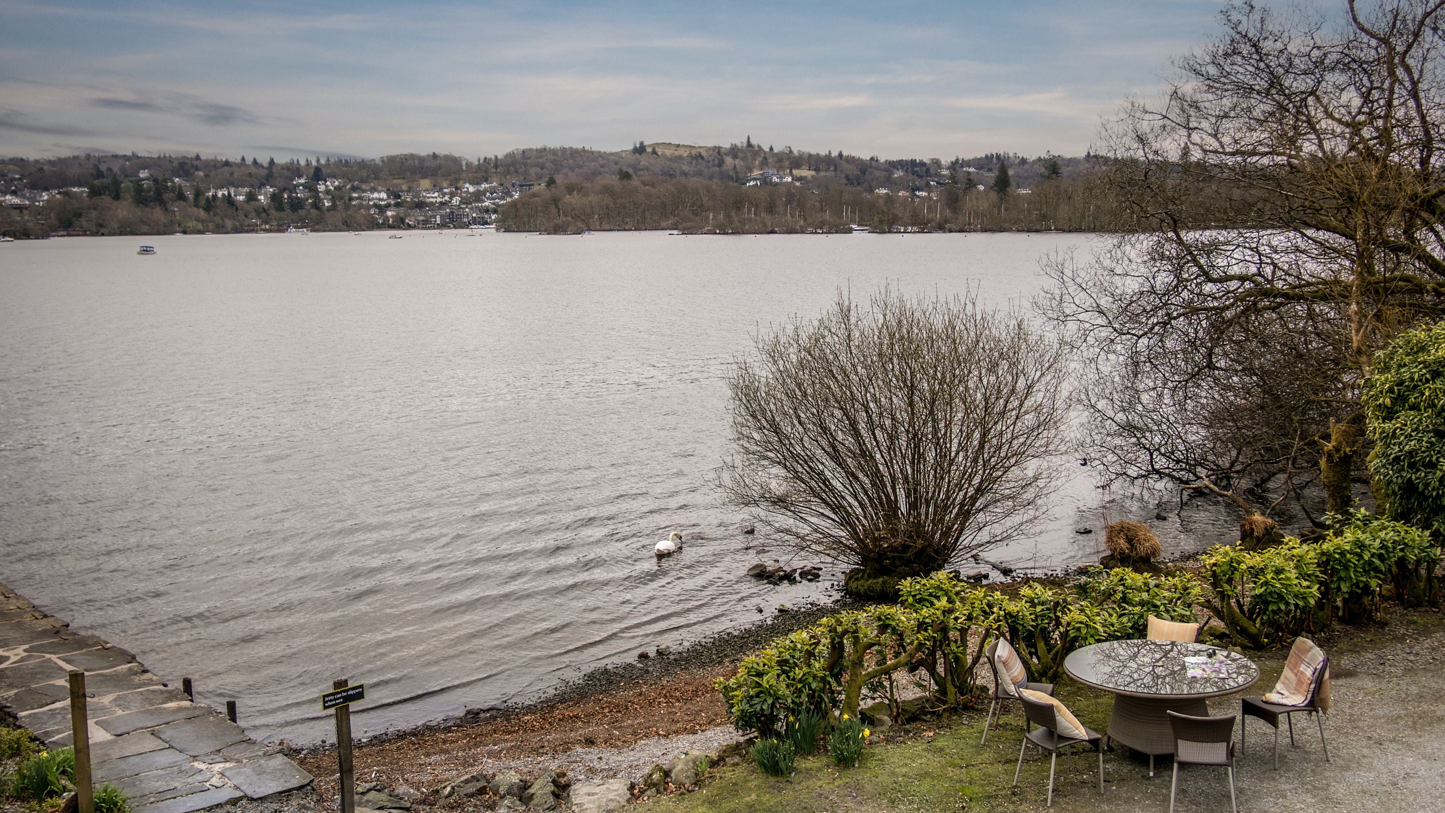 The outdoor seating area by the jetty outside Low Strawberry Gardens, Windermere, Cumbria