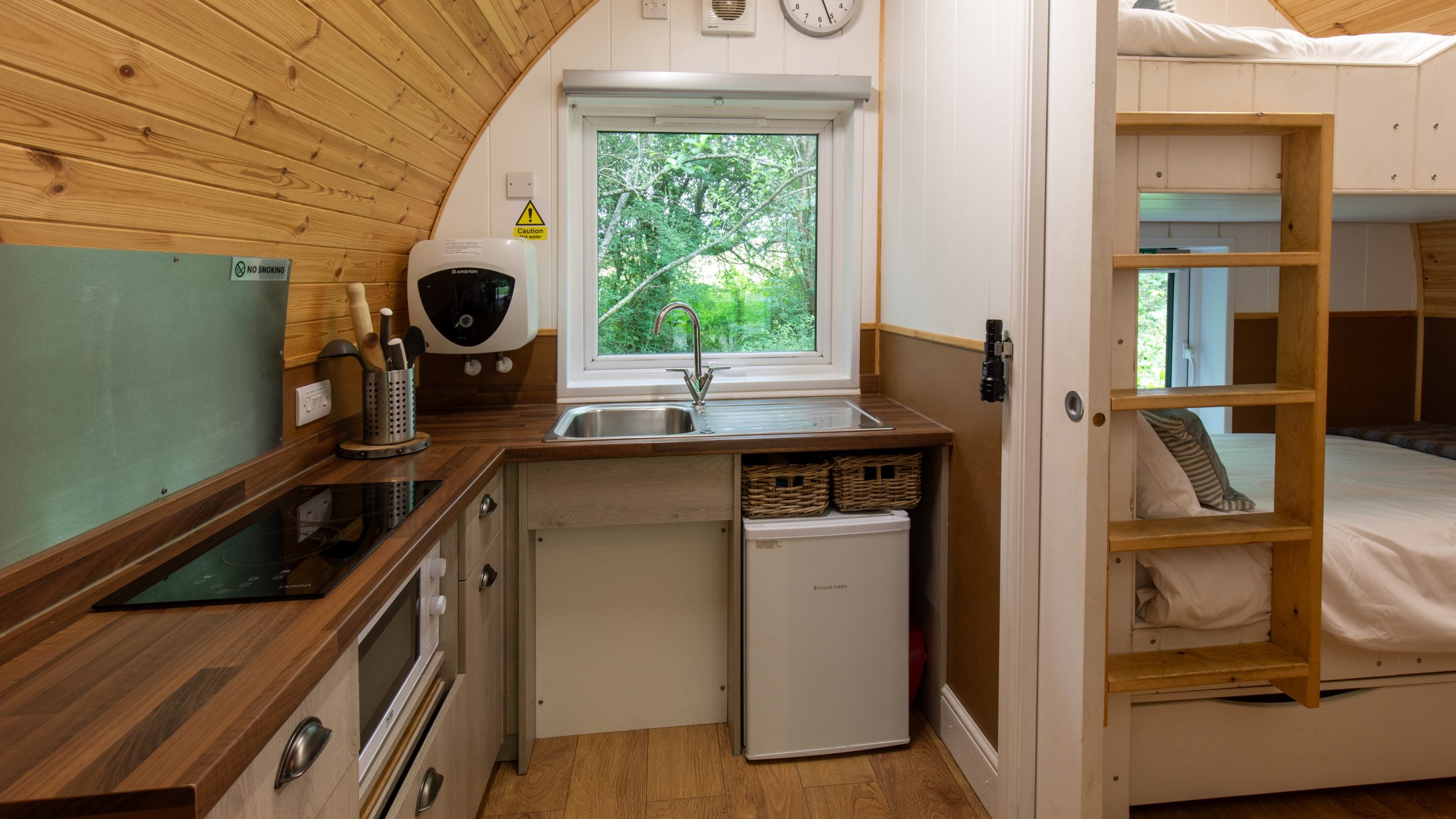 The kitchen in the accessible furnished pod at Low Wray Campsite, Cumbria