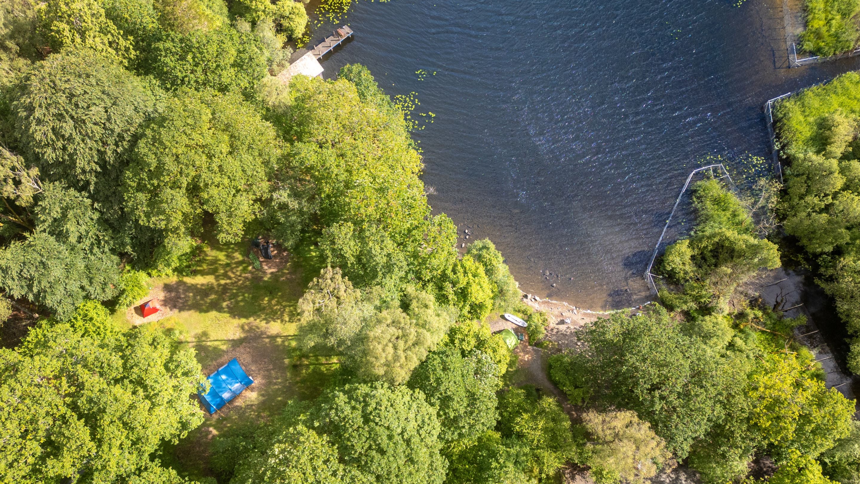 An aerial view of the lakeside pitches at Low Wray Campsite, Cumbria