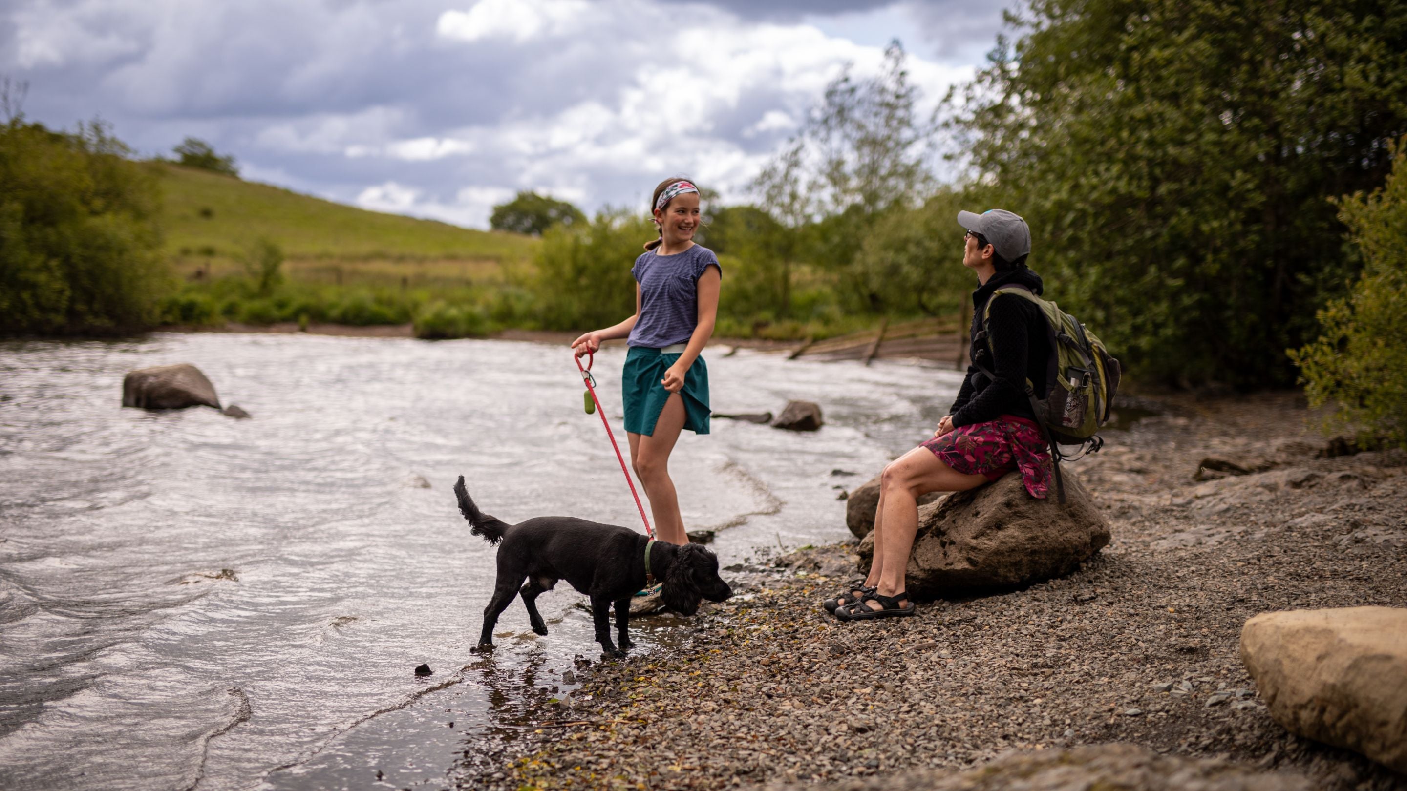 Playing by the lakeshore at Low Wray Campsite, Cumbria