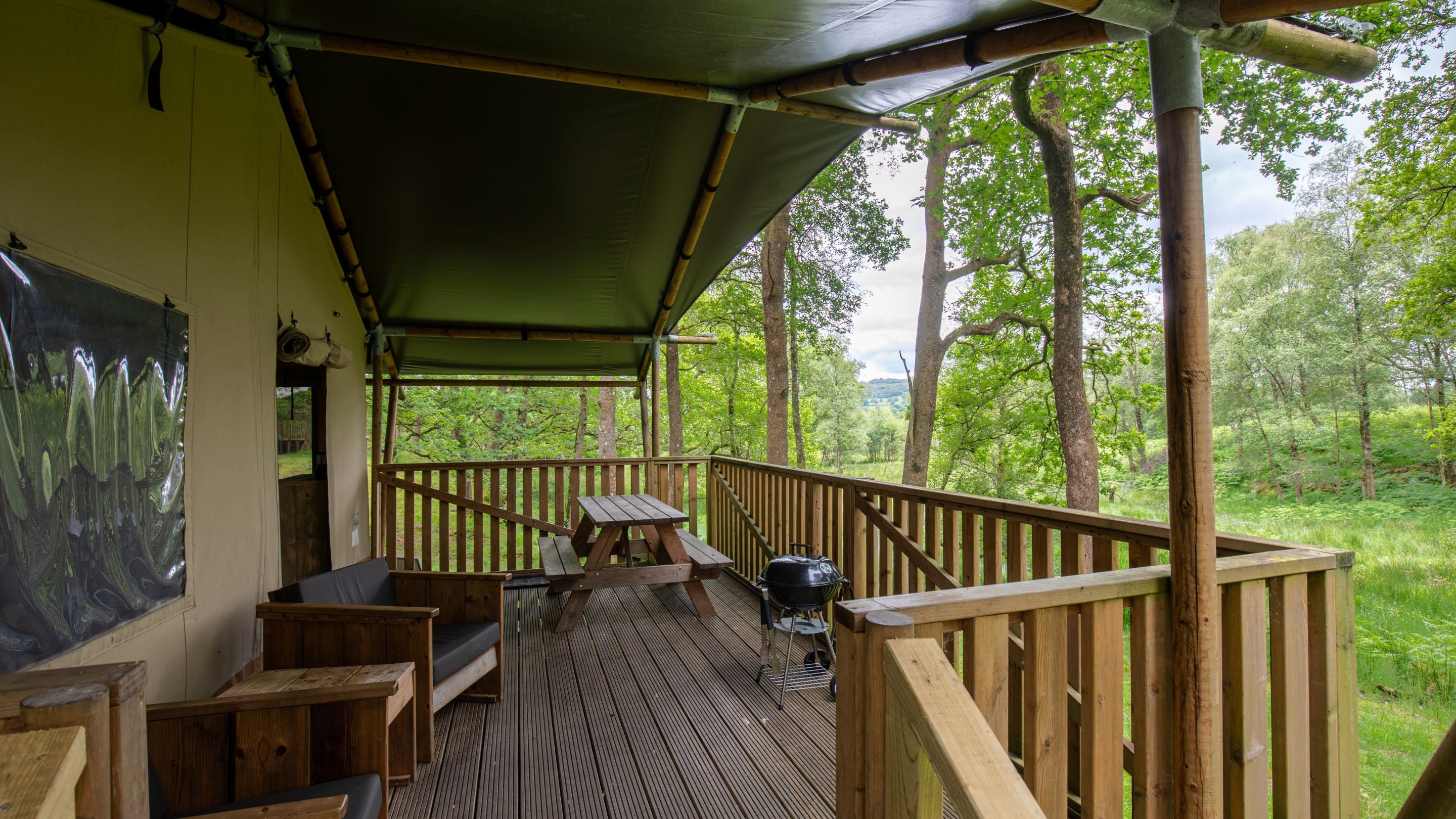 The deck of a safari tent at Low Wray Campsite, Cumbria