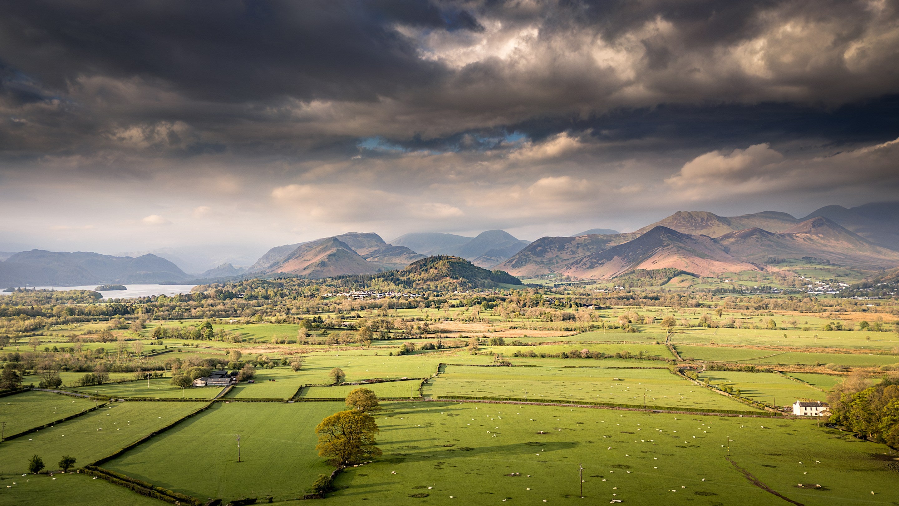 An aerial view of the Derwent fells with Derwentwater and Derwent Isle to the left, near Millbeck Towers, Cumbria