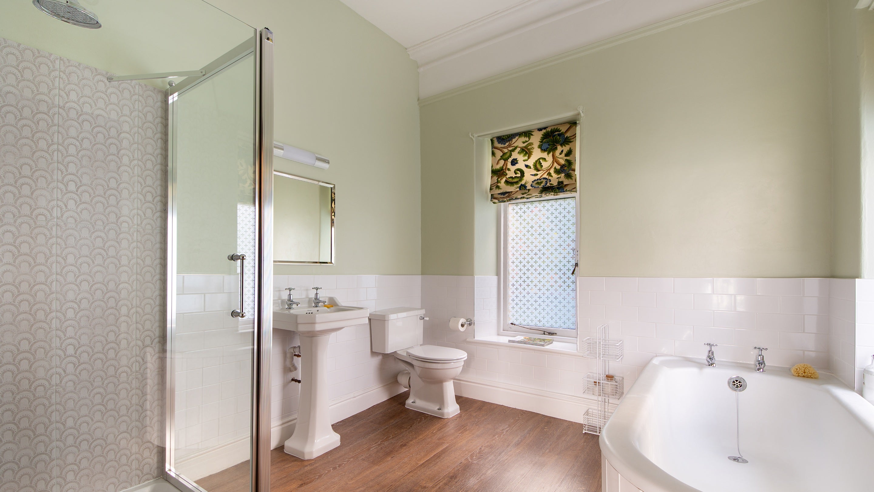 The first floor en-suite bathroom with freestanding bath and walk-in shower at Millbeck Towers, Cumbria