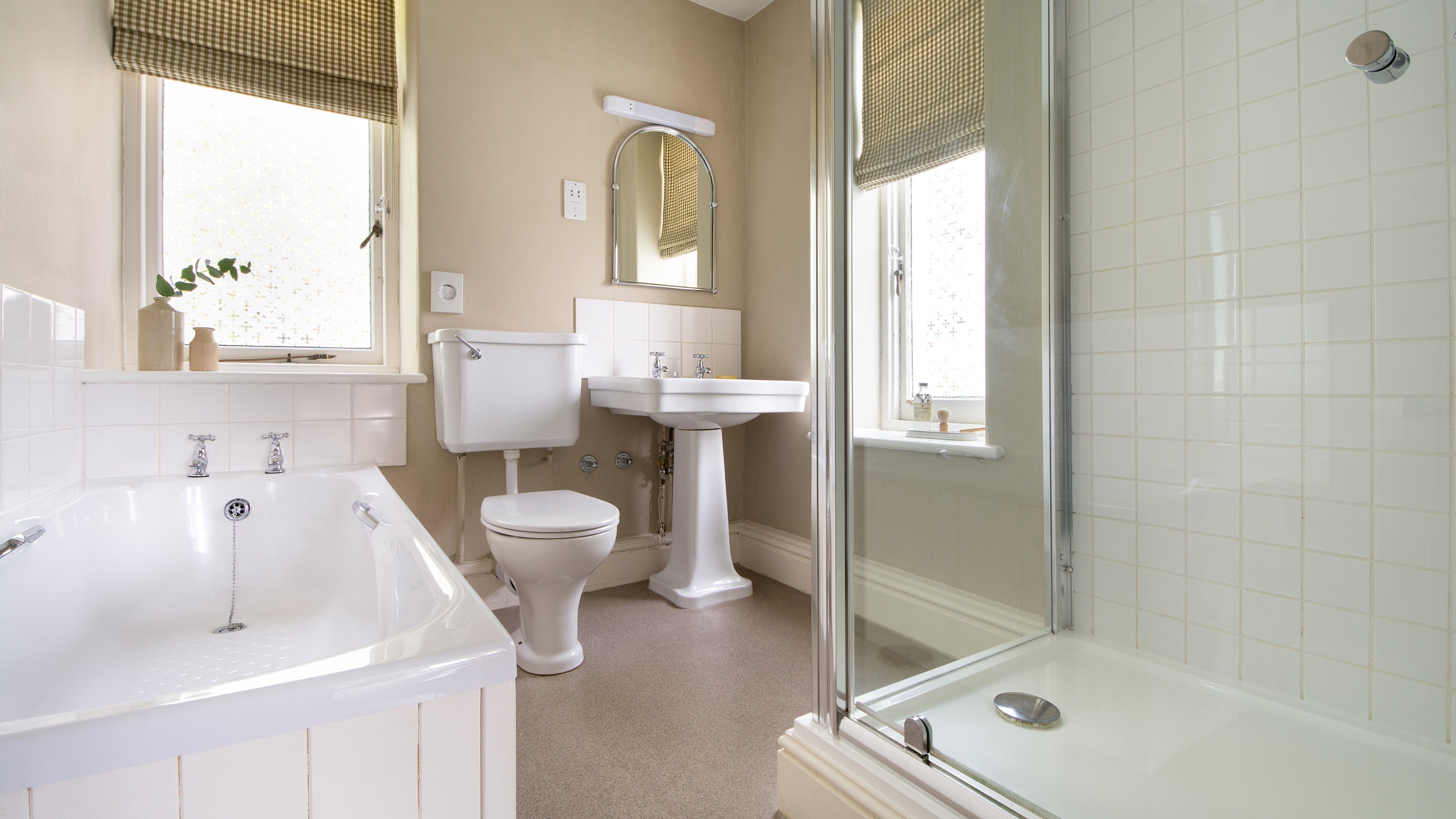 The second floor en-suite bathroom with freestanding bath and walk-in shower at Millbeck Towers, Cumbria