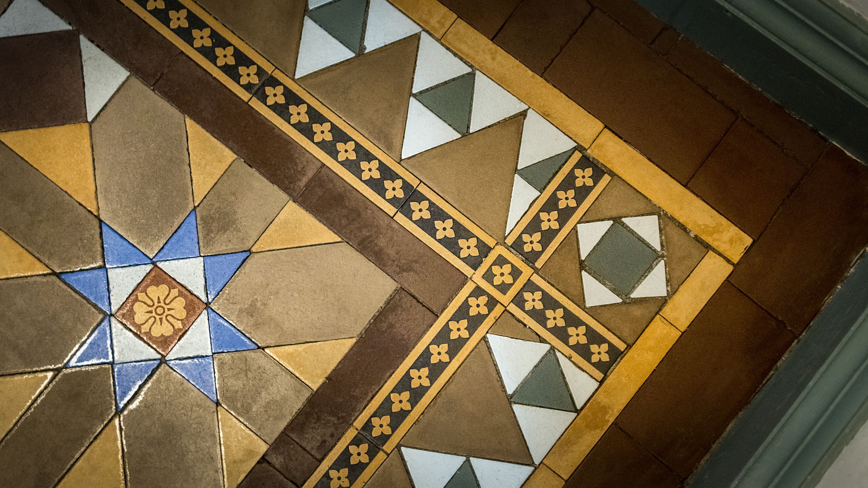 Restored tiles in the entrance hall of Millbeck Towers, Cumbria