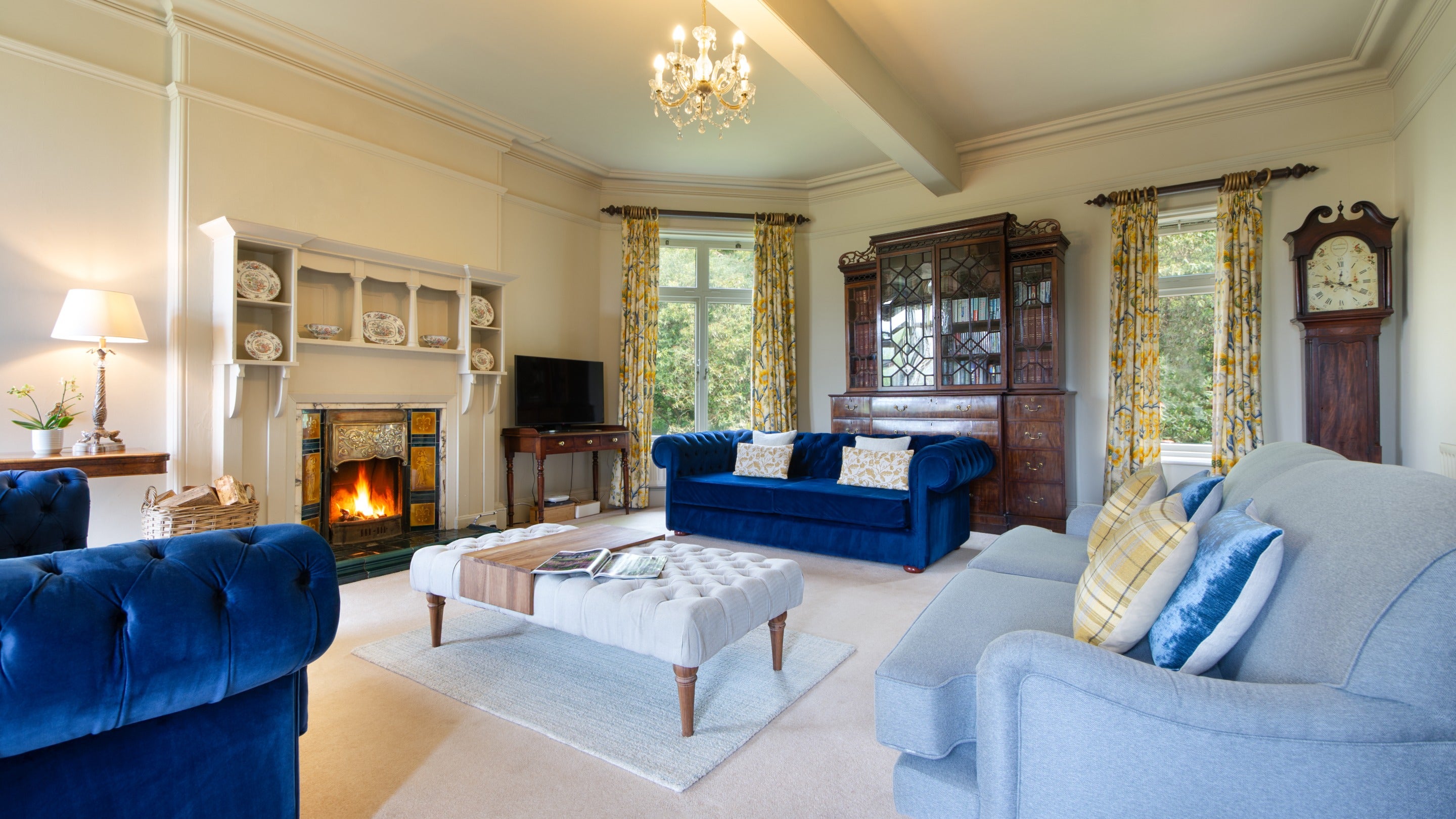 The sitting room at Millbeck Towers overlooks the large garden at the rear of the house, Cumbria