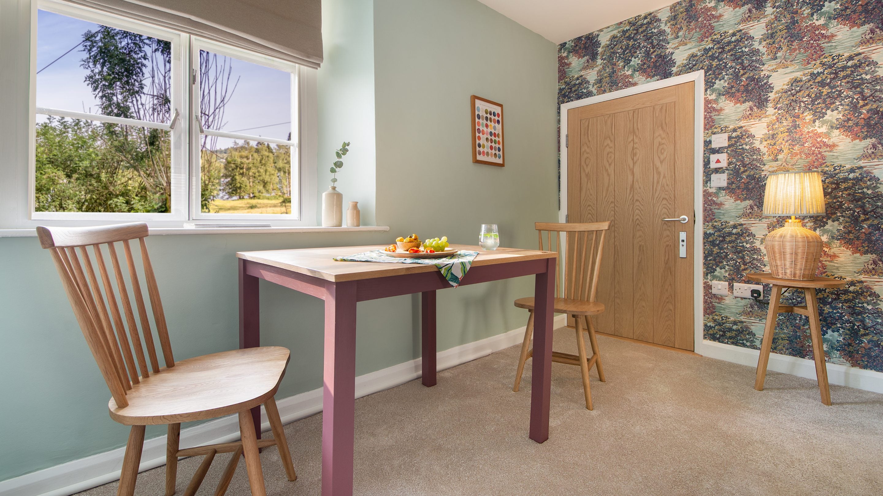 The dining area in the sitting room at Restharrow, Cumbria