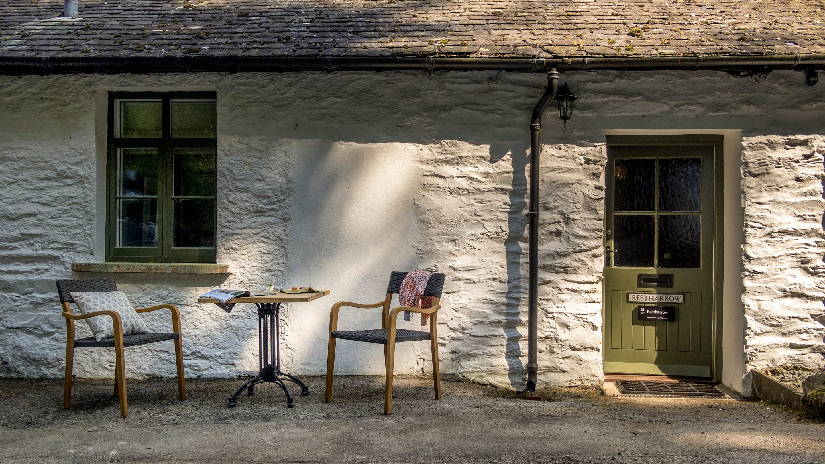 The table and chairs outside Restharrow, Cumbria