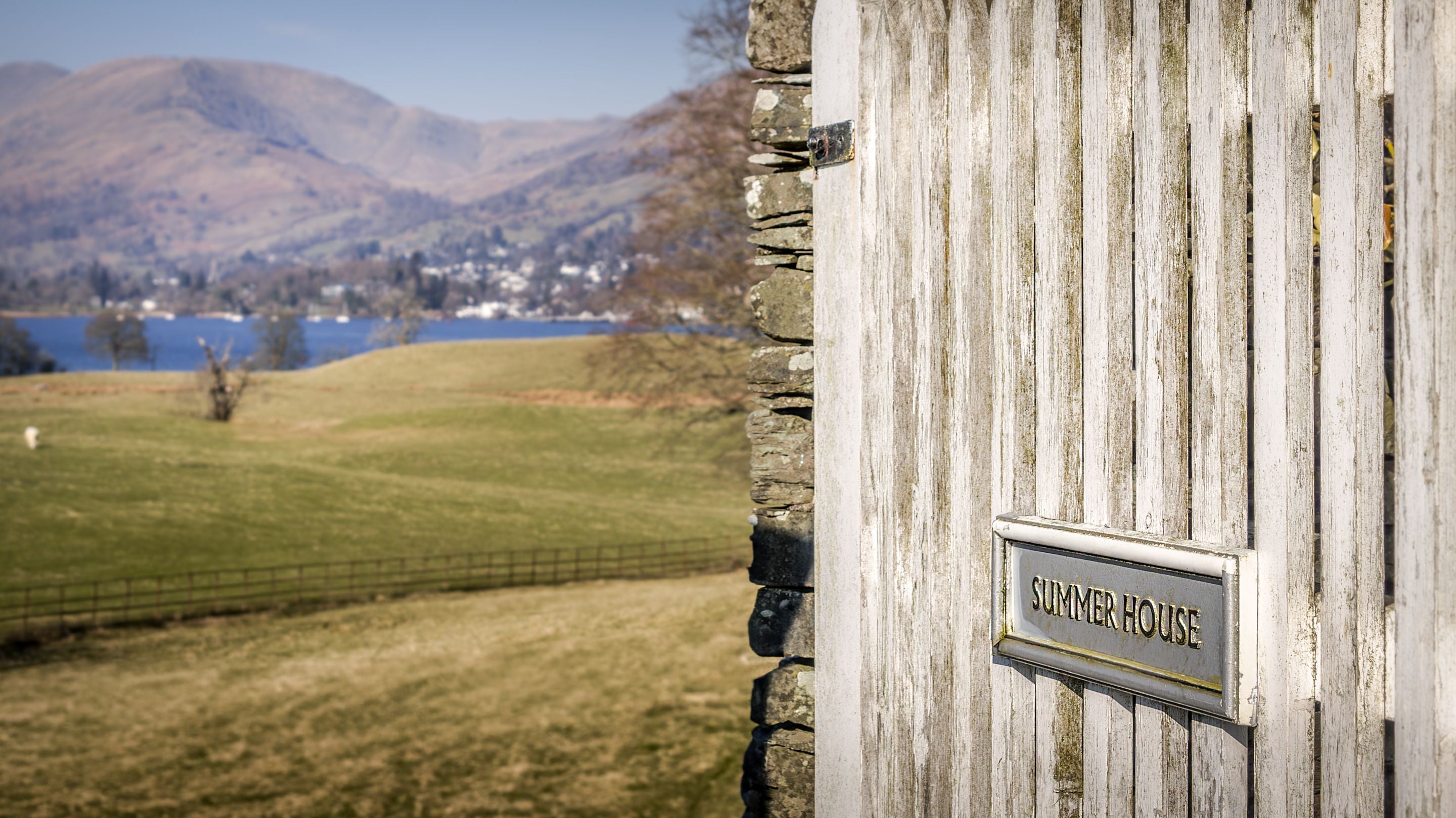 The gate to The Summer House, with Lake Windermere in the background, Cumbria
