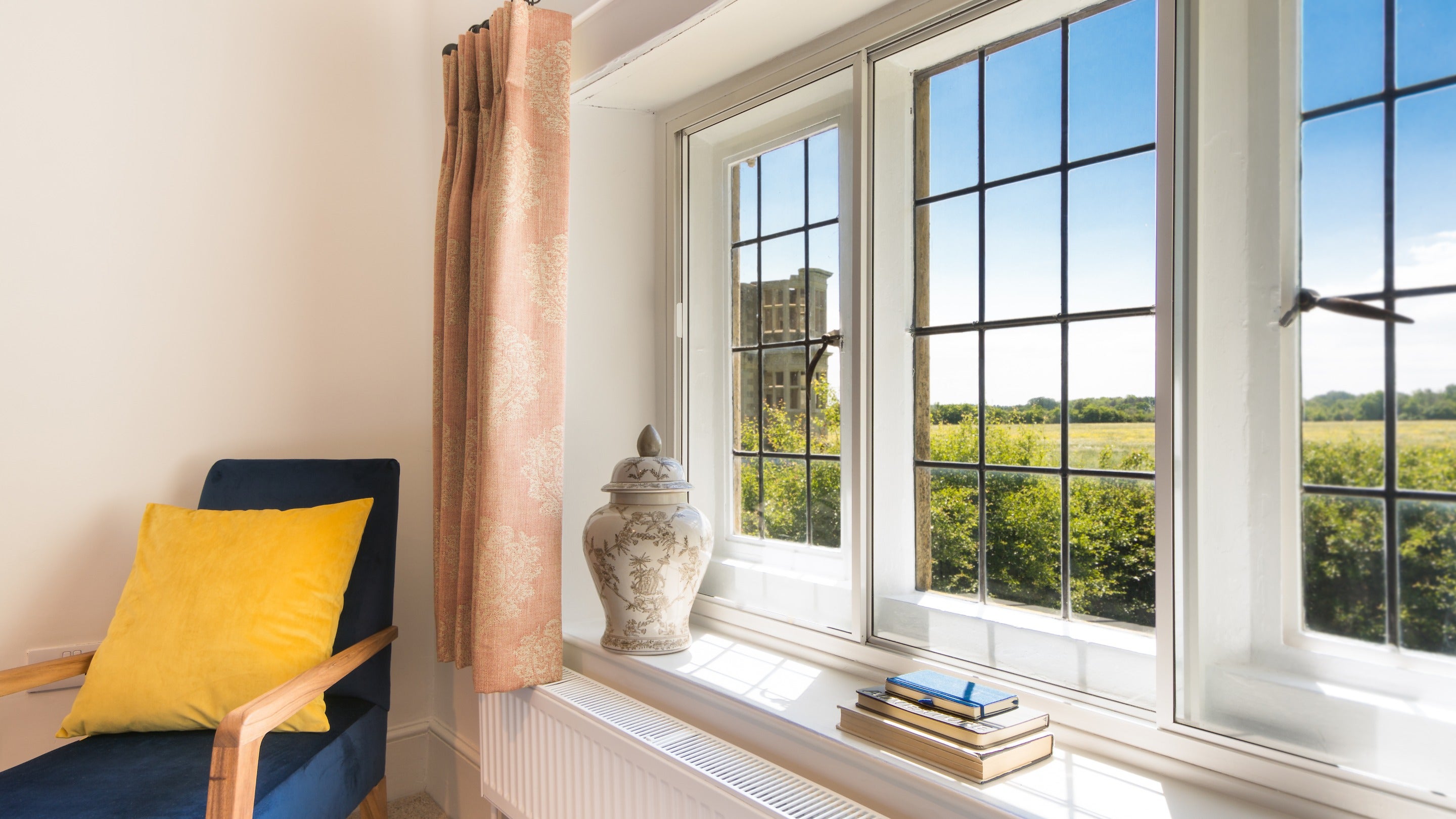 The view from one of the bedrooms at Lyveden Cottage, where you can see part of Lyveden Garden Lodge, Northamptonshire