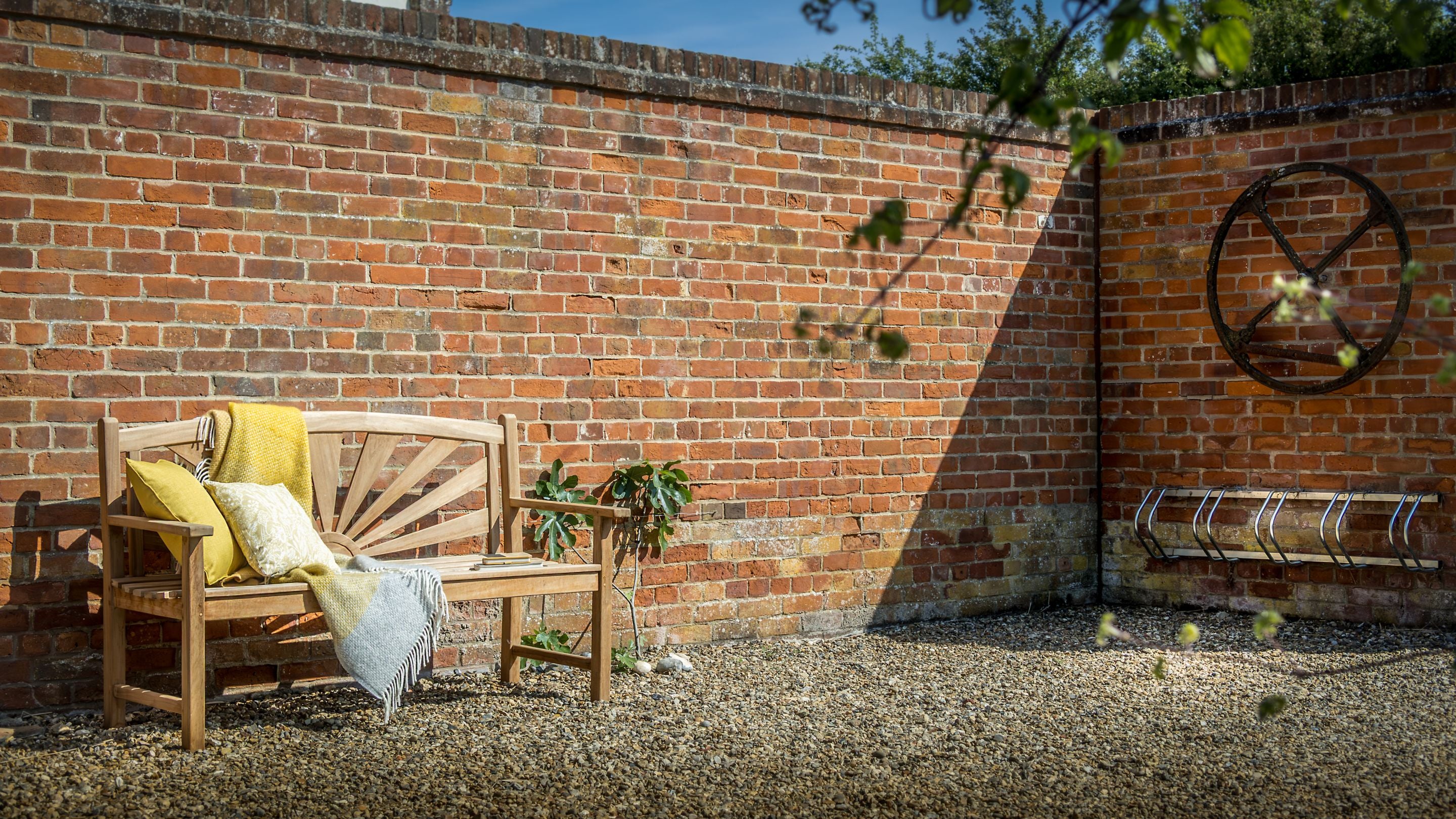The bench and bike rack in the courtyard shared by 1, 2 and 3 Horsey Barns, Norfolk