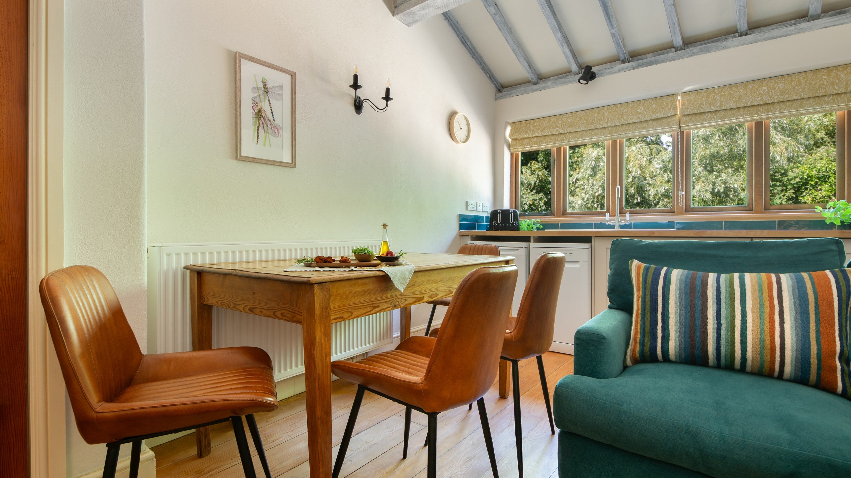 The dining table in the open-plan room at 2 Horsey Barns, Norfolk