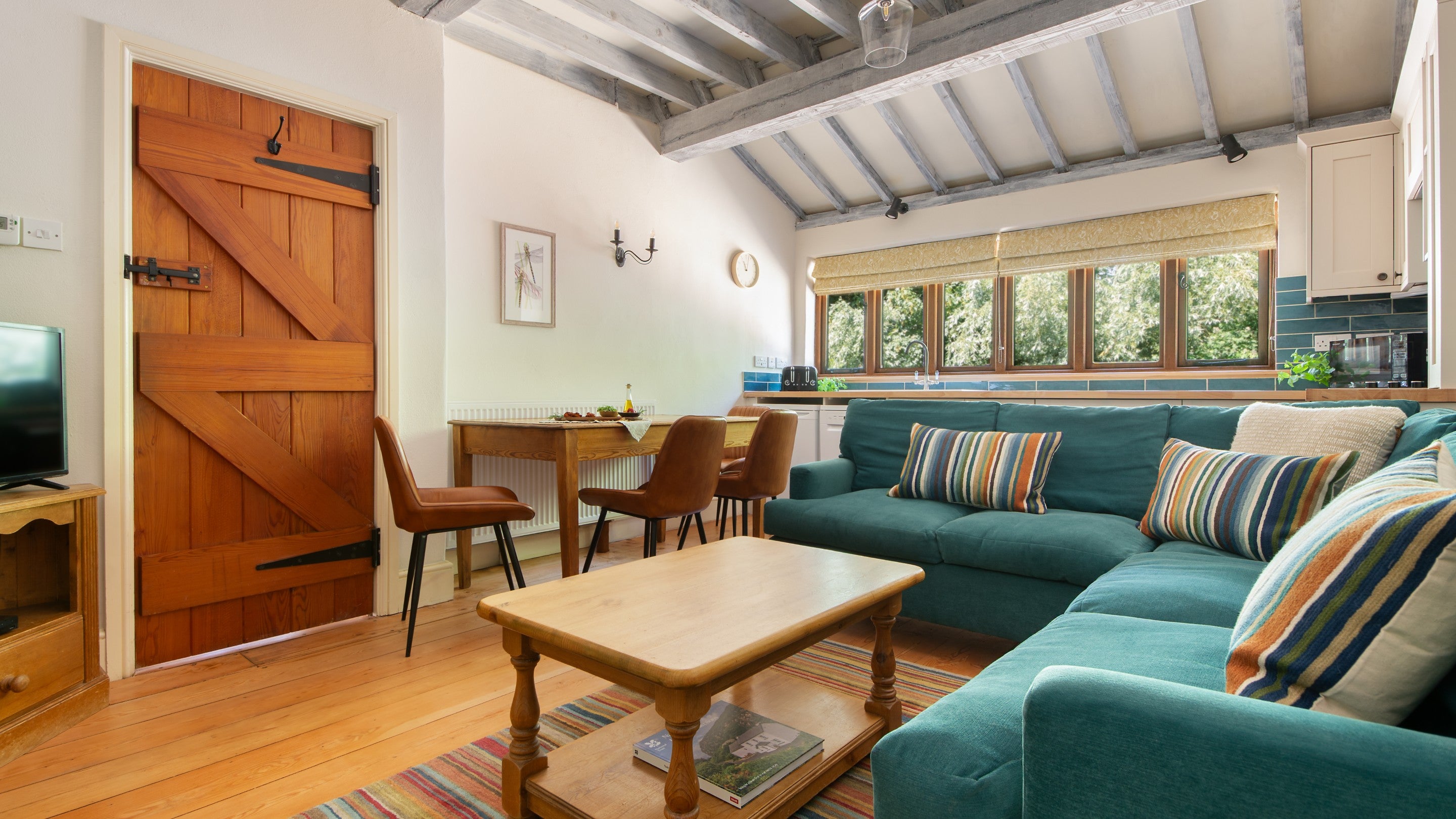 The open-plan kitchen, dining and sitting room at 2 Horsey Barns, Norfolk