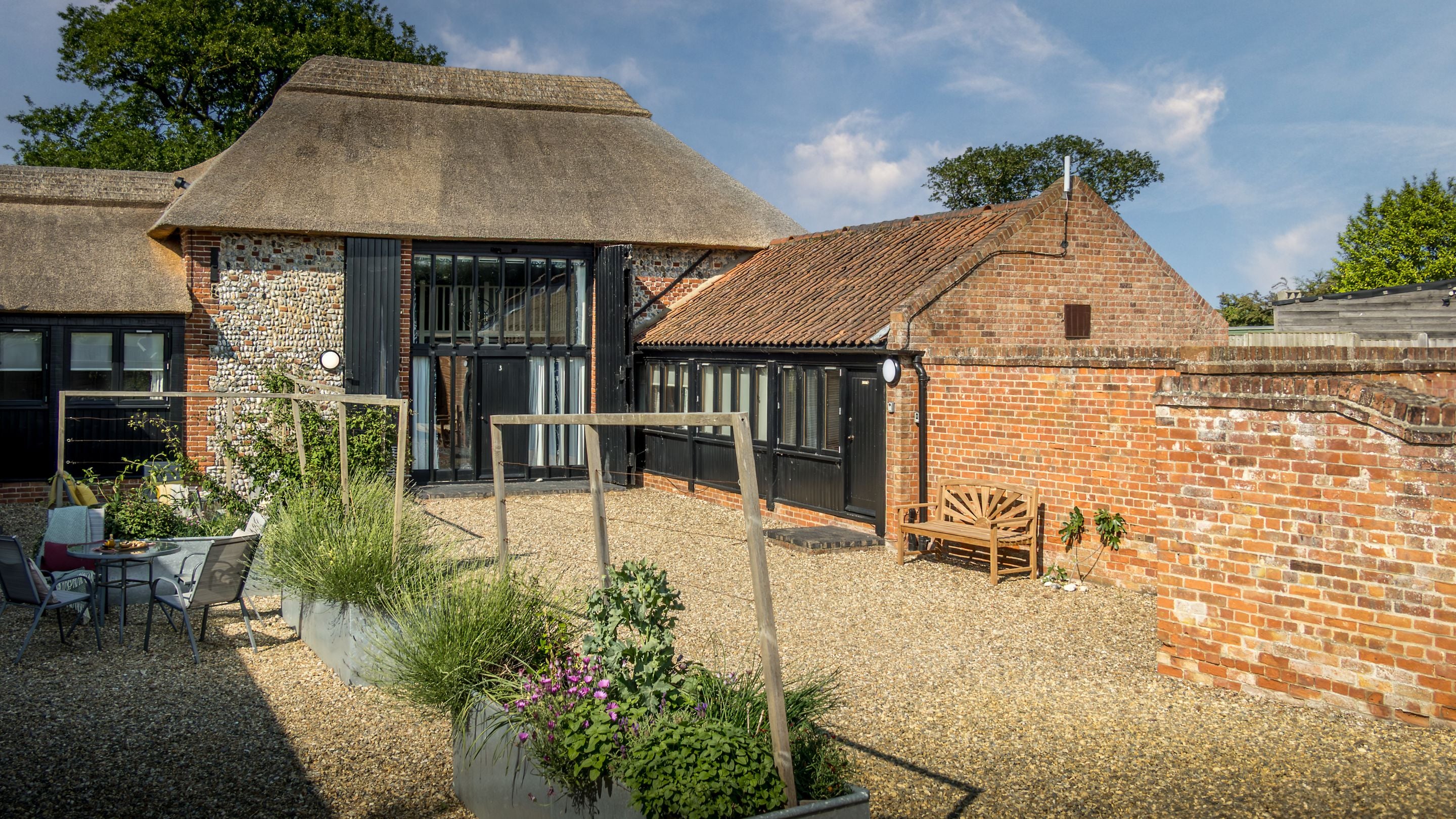 The courtyard shared by 1, 2 and 3 Horsey Barns, Norfolk