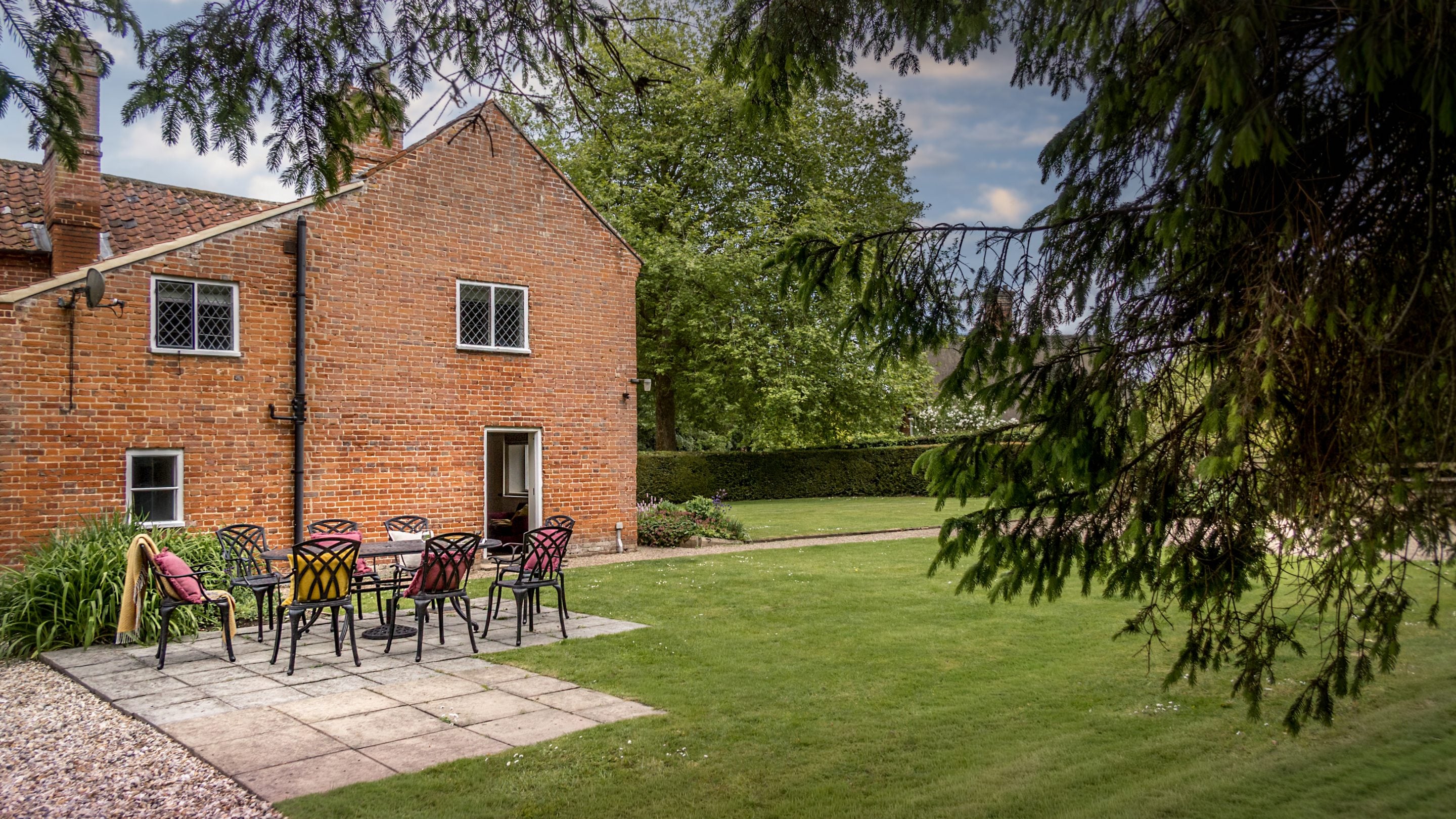 The patio and lawned garden at 4 Park Gates, Norfolk