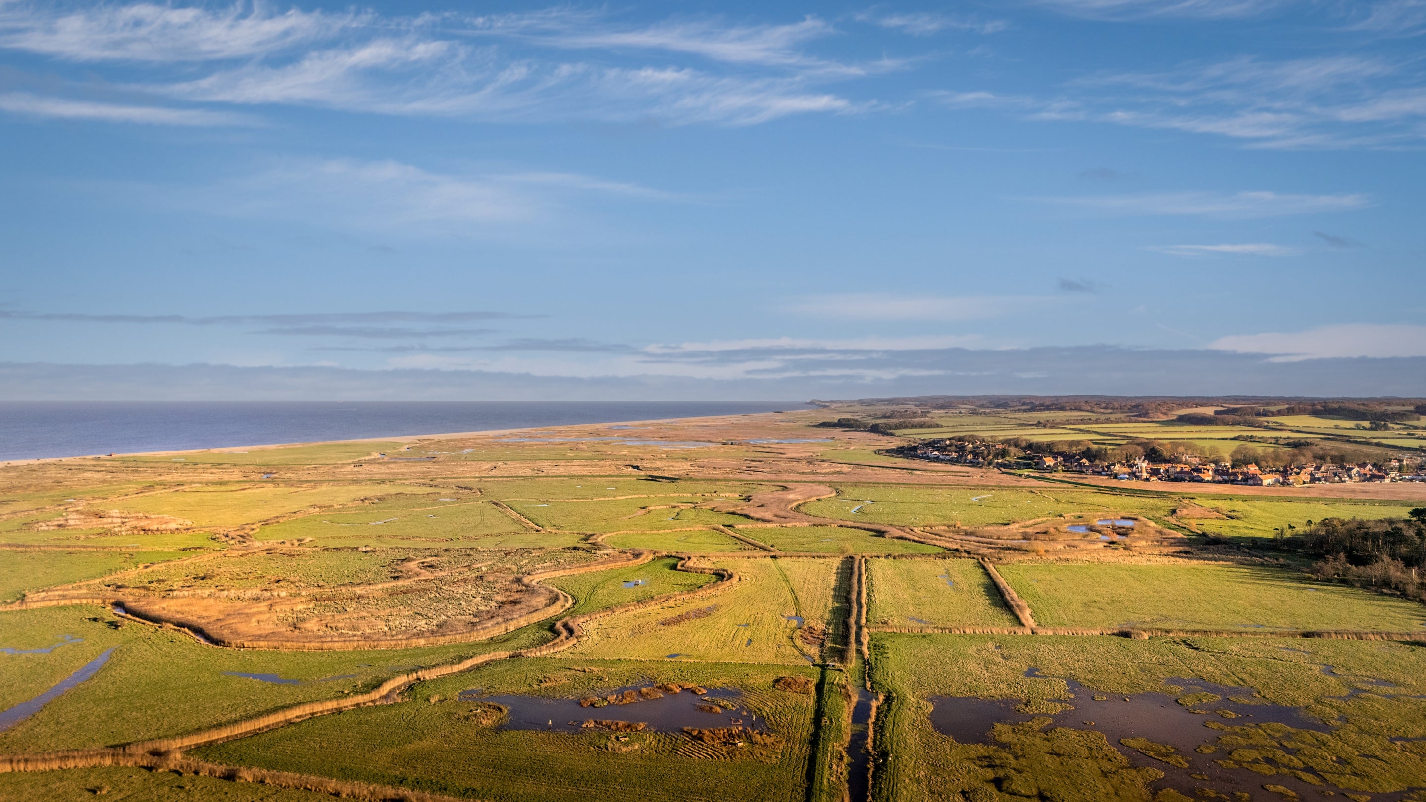 An aerial view of the marshes and coast near Blakeney Lodge, Norfolk.