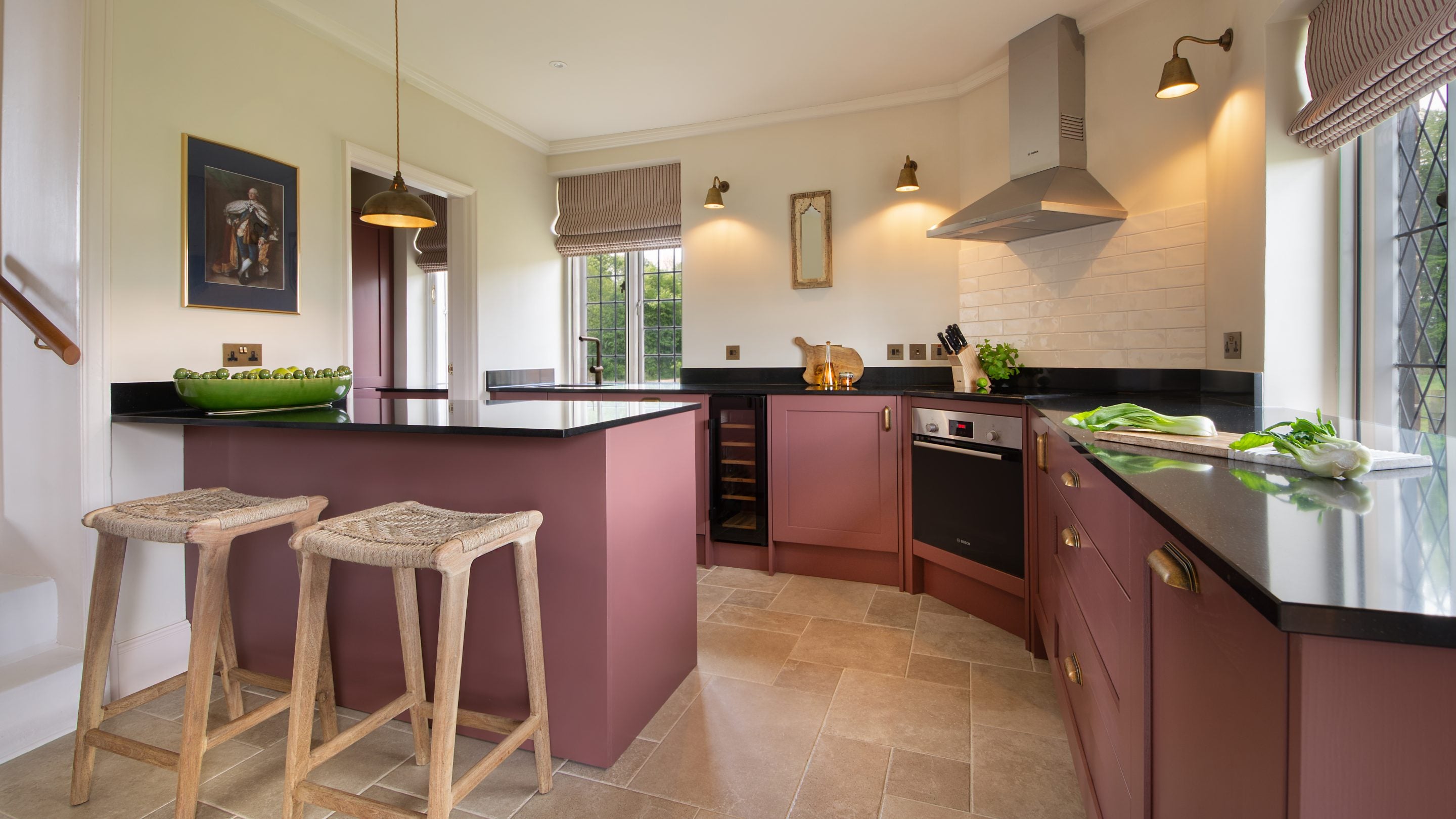 The kitchen at Blickling Tower, with two stools at the island, Norfolk