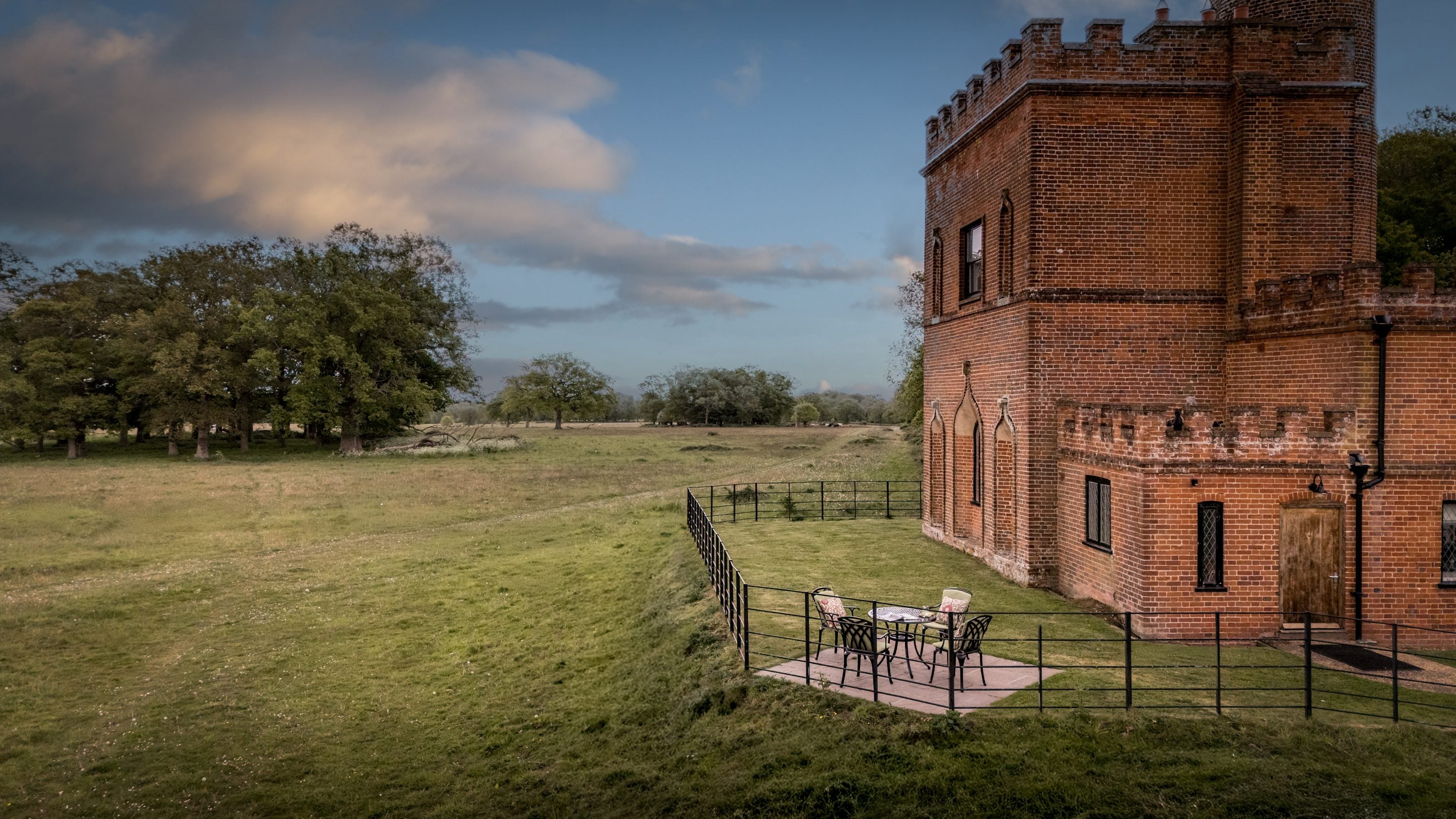 The ground-level patio and surrounding parkland at Blickling Tower, Norfolk