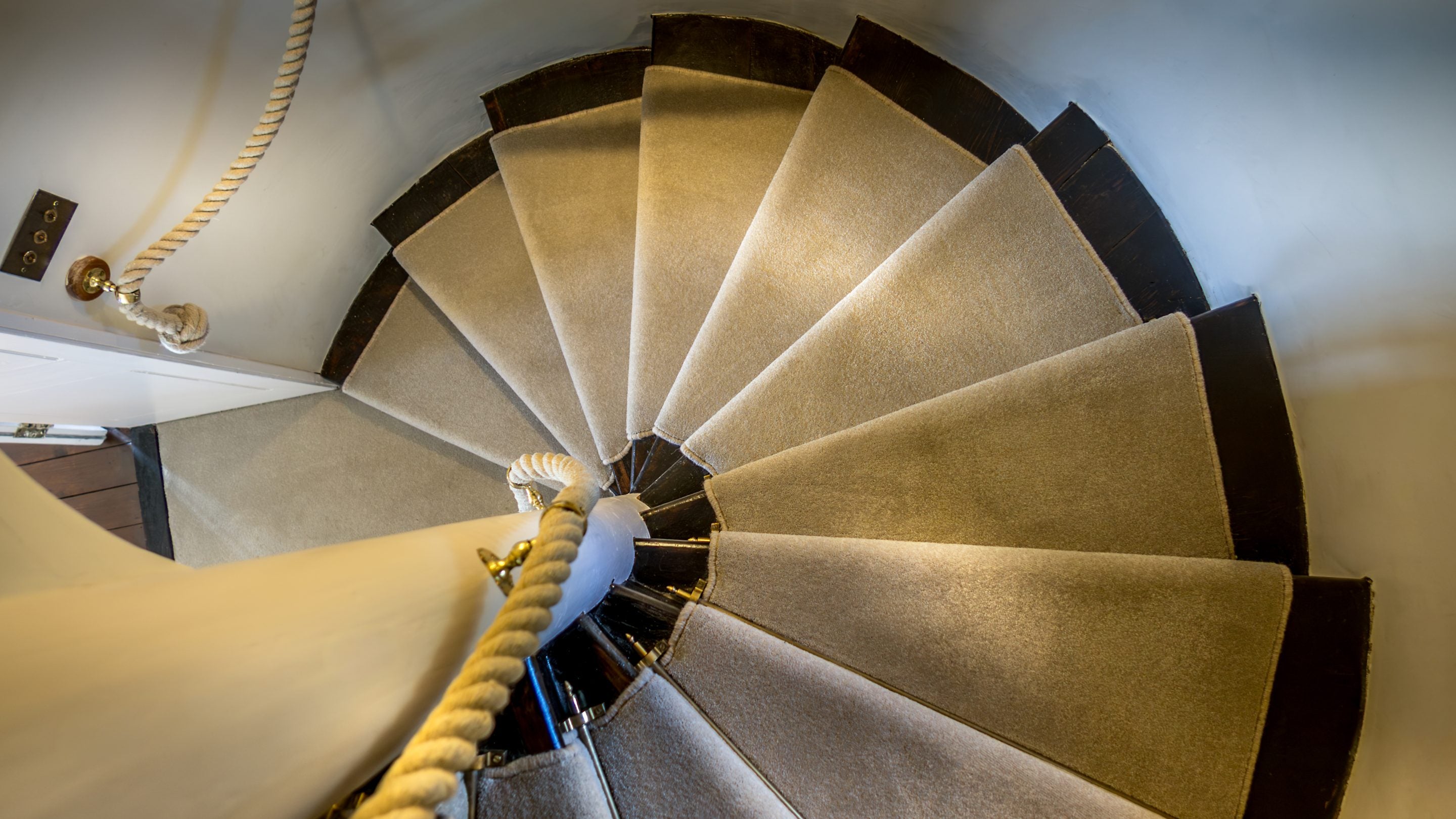 The enclosed spiral staircase leading up to the bedrooms at Blickling Tower, Norfolk